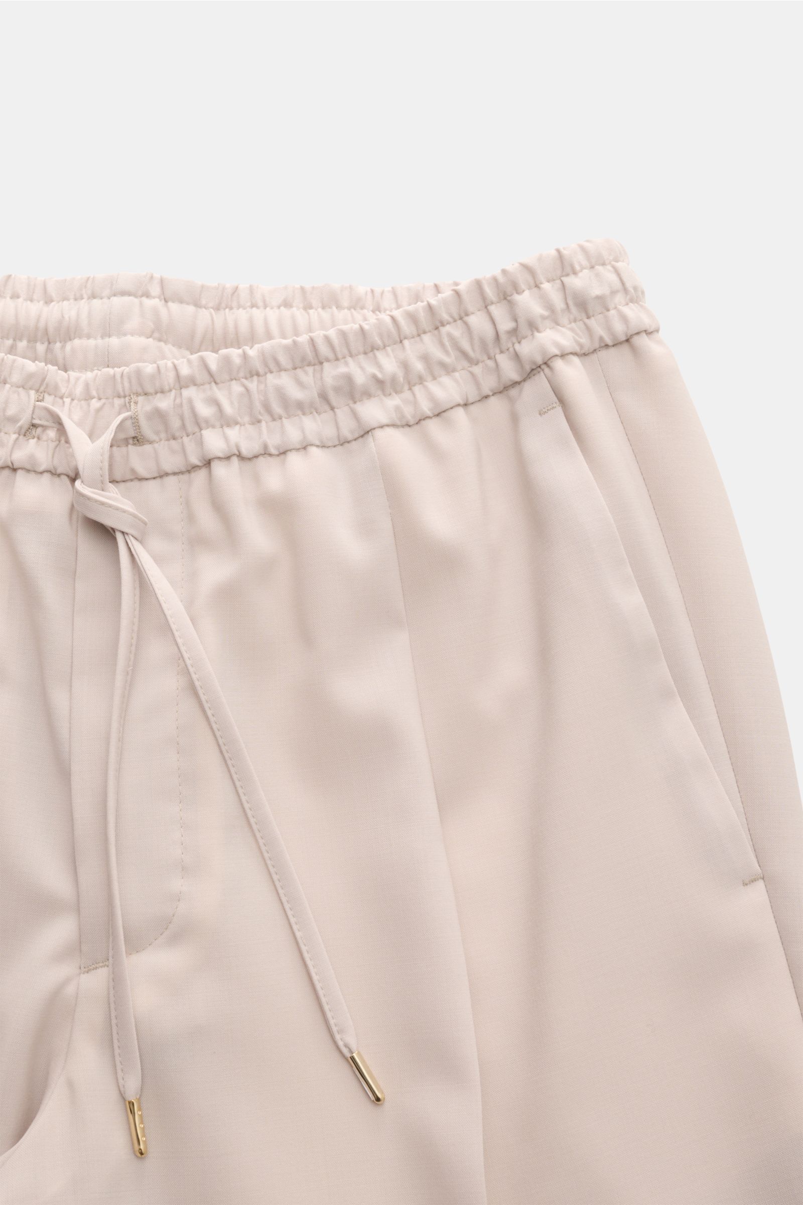 Close-up front view of Briglia 1949 Wool jogger pants 'Wimbledon' sand, lightweight wool-microfibre blend with elasticated waistband, drawstring, zip fly, single pleat, French pockets, tapered ankle-length fit, and soft feel, perfect for business and casu