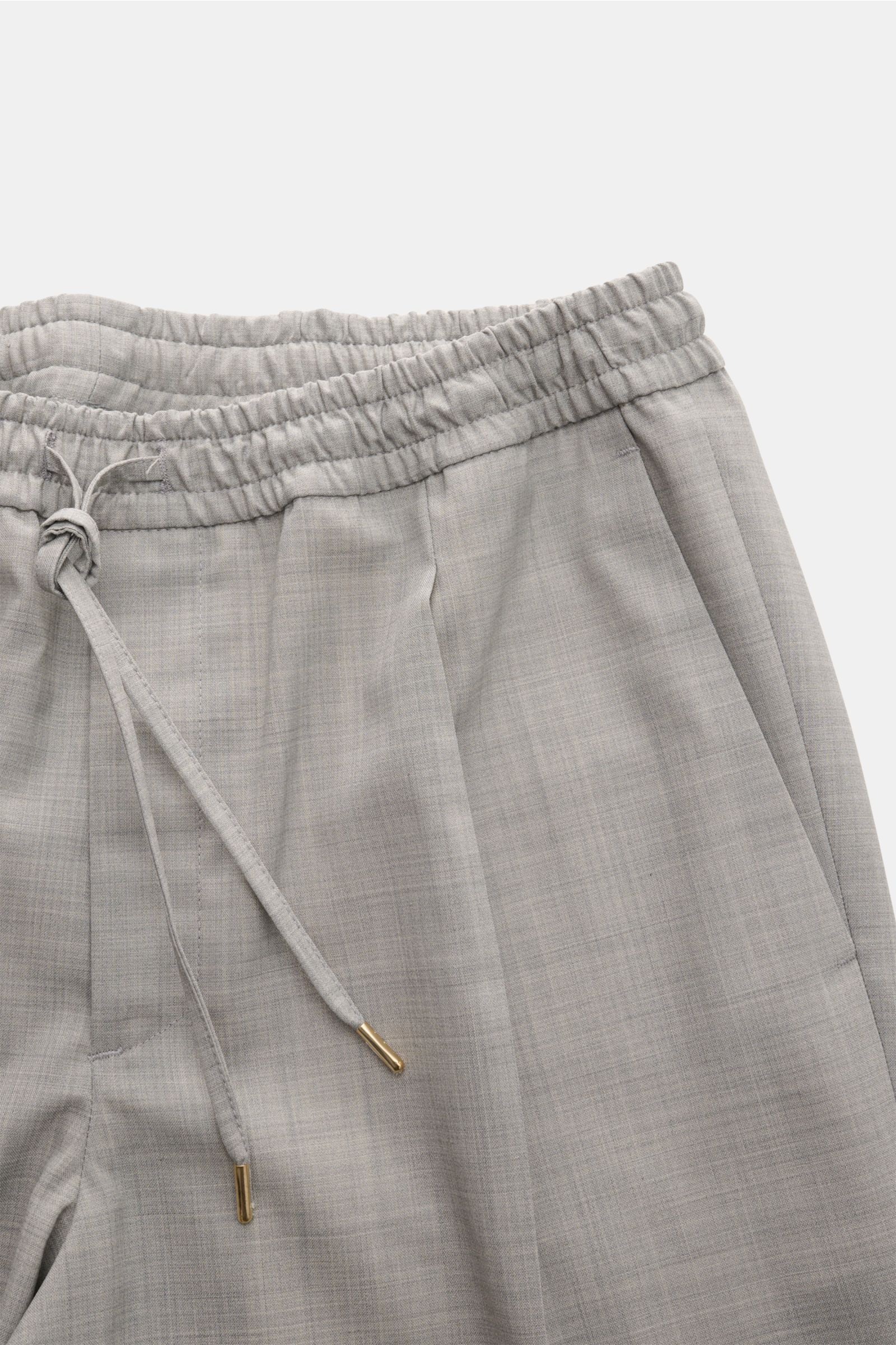 Close-up front view of Briglia 1949 Wool jogger pants 'Wimbledon' light grey mottled showing high waist, elasticated waistband with drawstring, zip fly, single pleat, and French pockets. Italian style and maximum comfort meet in these lightweight trousers