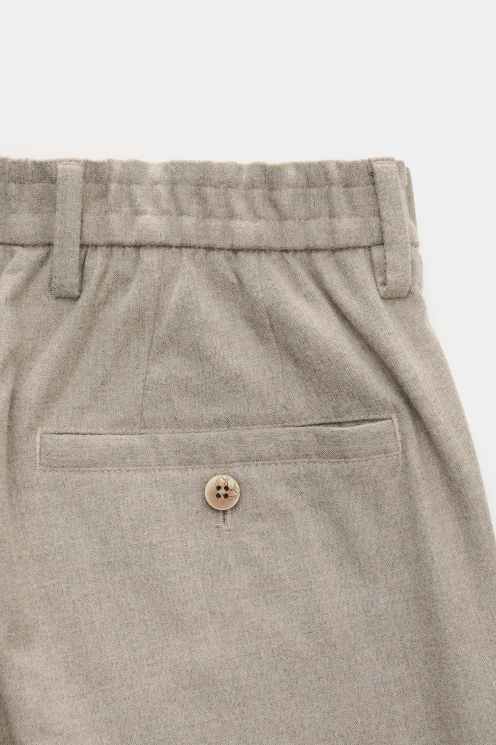 GTA Trousers 'Davide' beige mottled shown from a close-up rear view, highlighting back pocket with button and textured fabric. Elegance meets comfort: These trousers with a partially elasticated waistband by GTA have a comfortable fit and a timeless desig