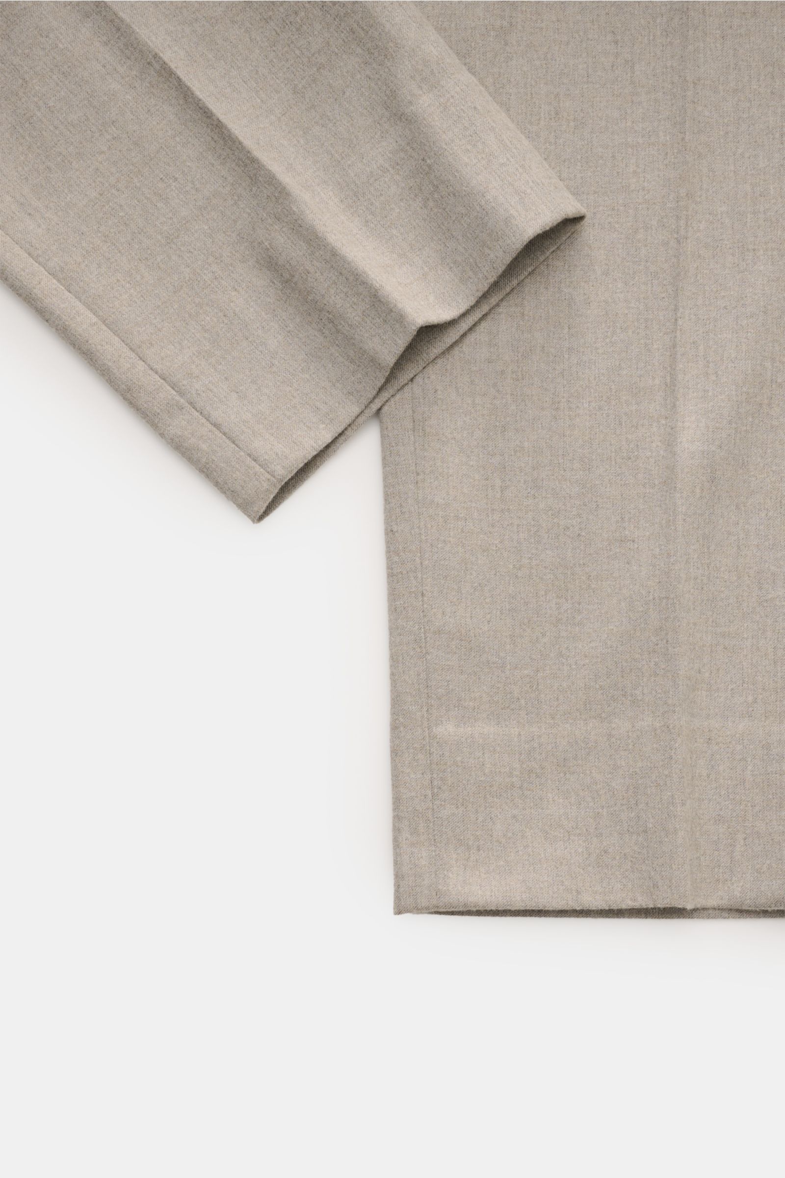 Close-up front view of GTA Trousers 'Davide' beige mottled showing tapered ankle length legs with soft viscose microfiber fabric.

Elegance meets comfort: These trousers with a partially elasticated waistband by GTA have a comfortable fit and a timeles