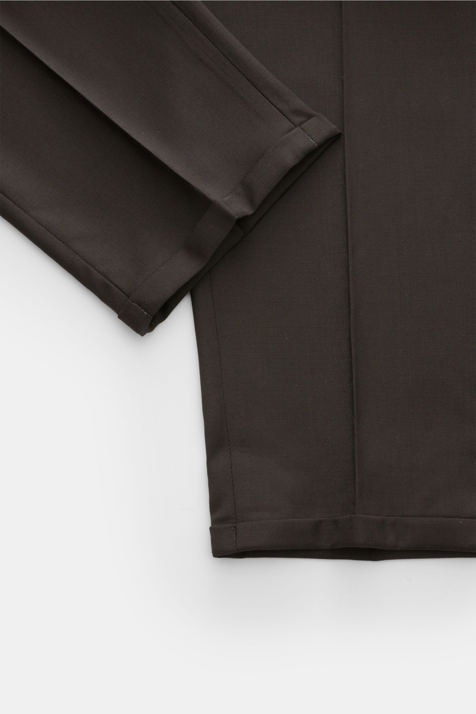 Close-up top-down view of PT Torino Trousers 'The Rebel' dark brown ankle-length leg with fixed hem turn-up, showcasing soft wool-microfibre fabric.

Description: 'The Rebel' from trouser experts PT TORINO is guaranteed to be your faithful companion fo