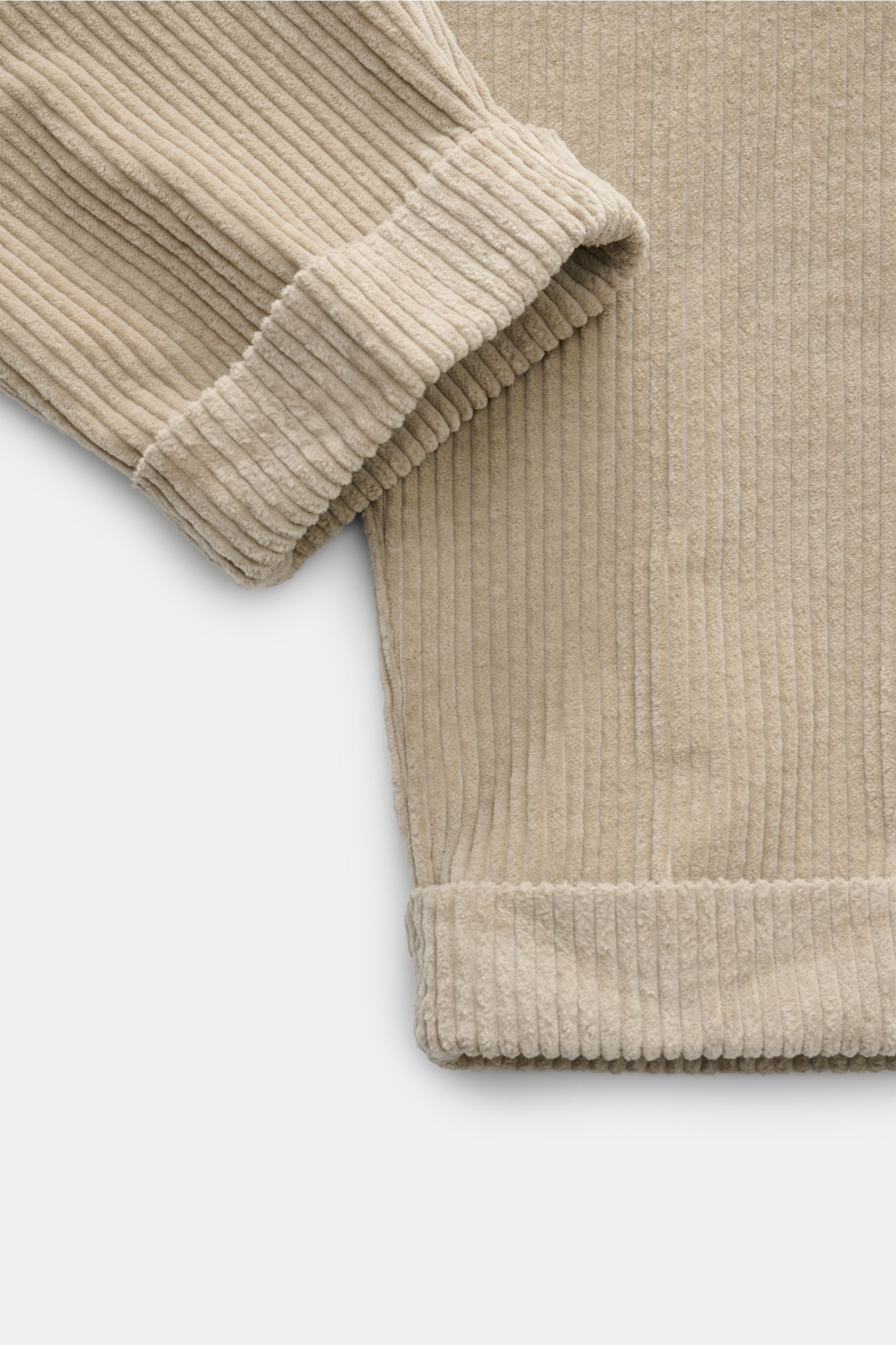 Close-up front view of Berwich Cordhose 'Chiaia' sand, showing detailed wide cotton corduroy fabric with soft texture and folded hem cuffs.