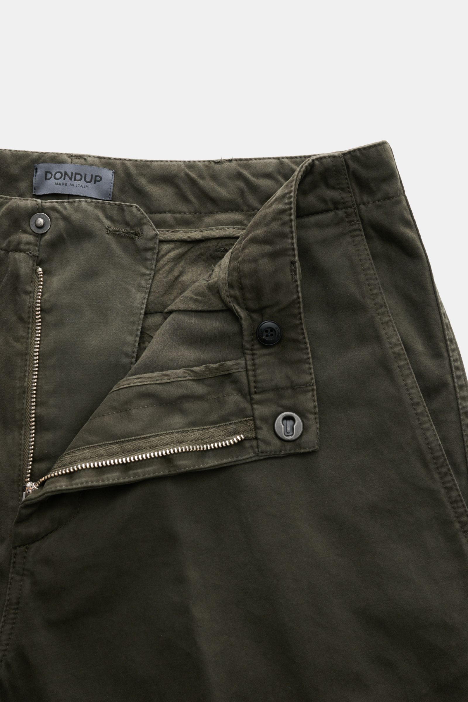 Close-up front view of Dondup Cotton trousers dark green showing open zipper, waist button, and detailed stitching.

Description: A timeless companion for any occasion: These cotton trousers by DONDUP combine comfort with stylish elegance for a versati