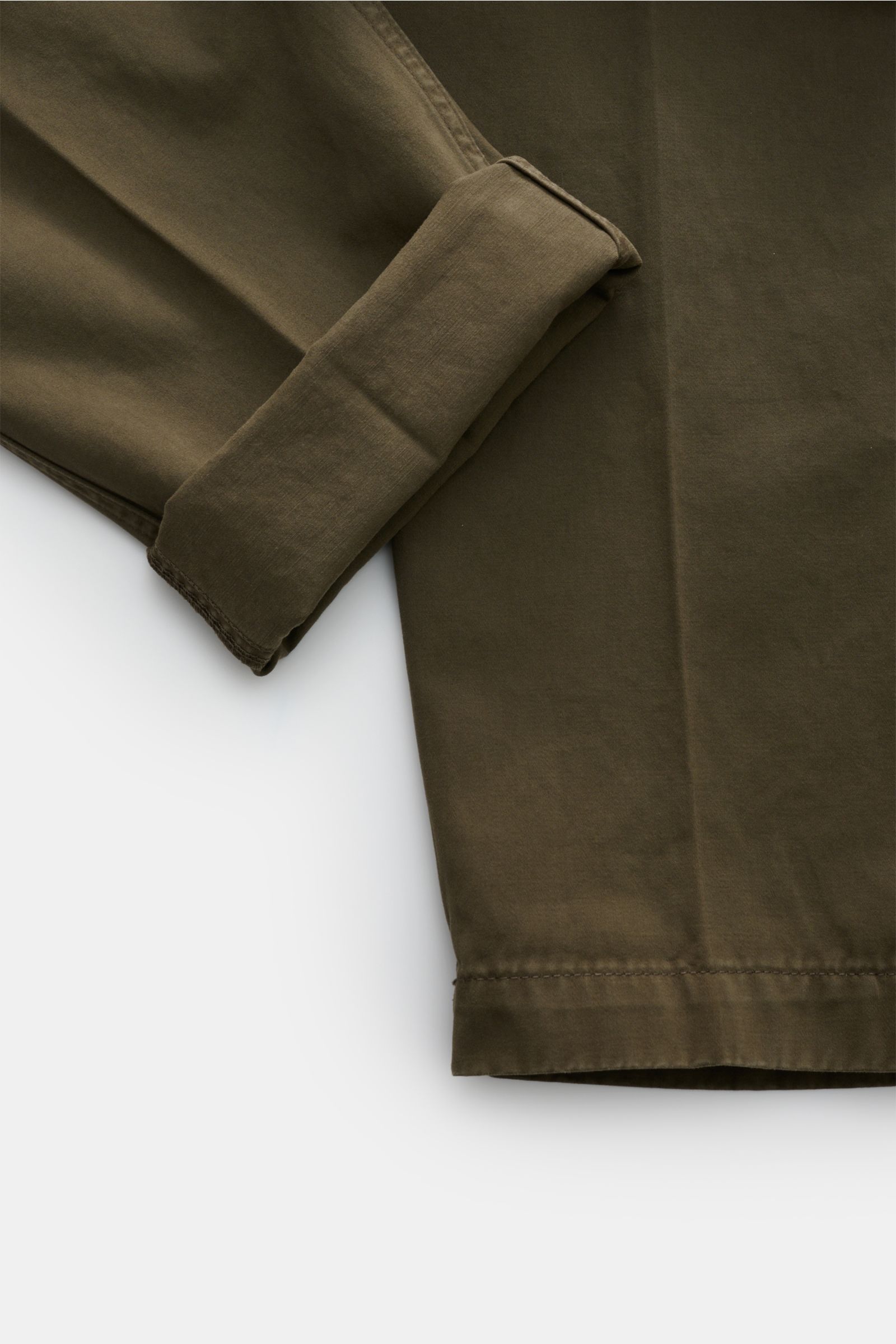 Close-up top view of Dondup Cotton trousers olive showing ankle-length tapered fit with folded cuff and smooth pure cotton fabric, combining comfort with stylish elegance for office and casual looks.