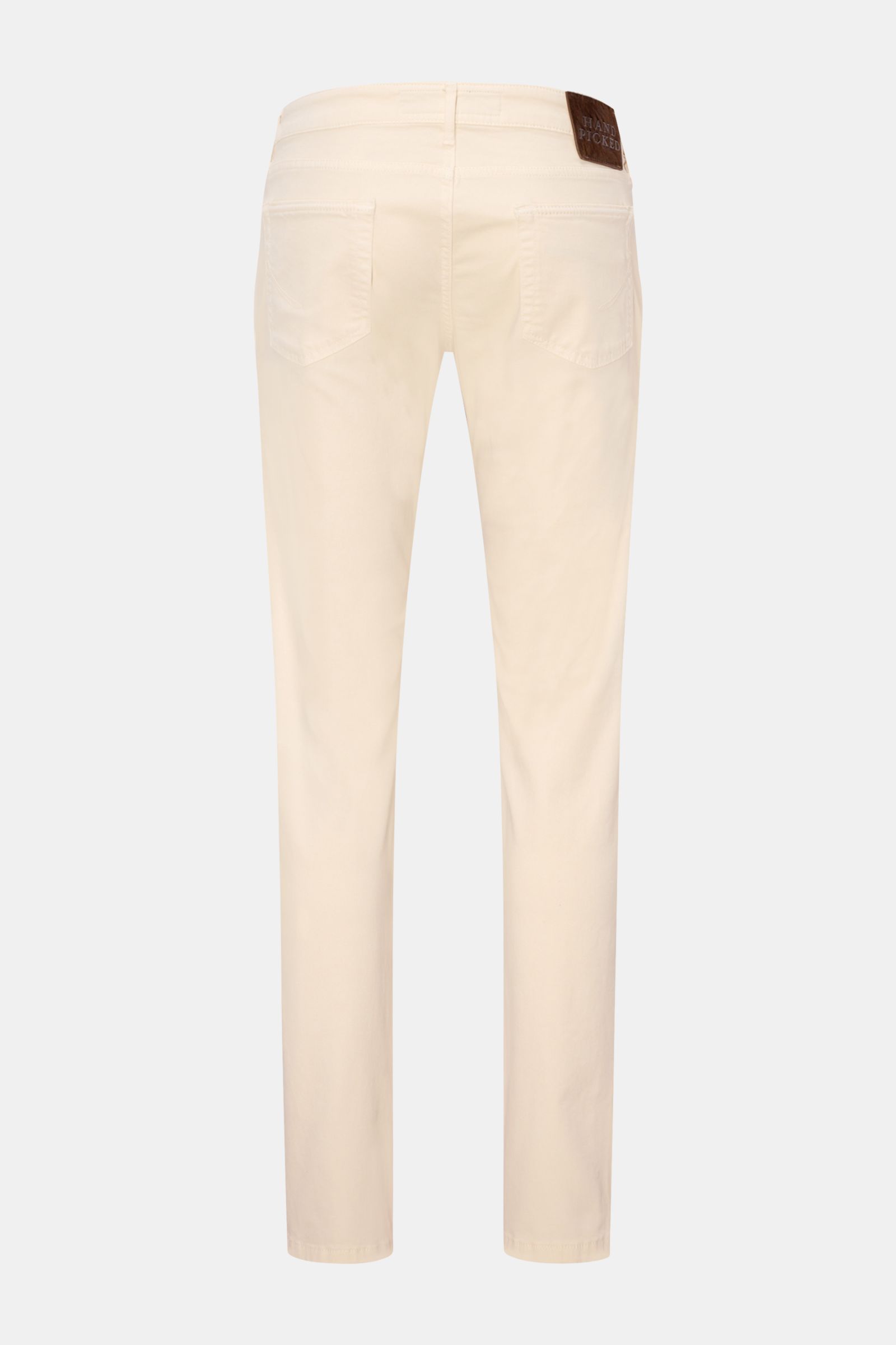 Back view of HandPicked Chinos 'Parma' cream in cotton twill, slim fit with very tapered cut, button fly, French pockets, coin pocket with initial, back pockets with stitching, soft slightly elasticated fabric, and leather patch in pony skin look.