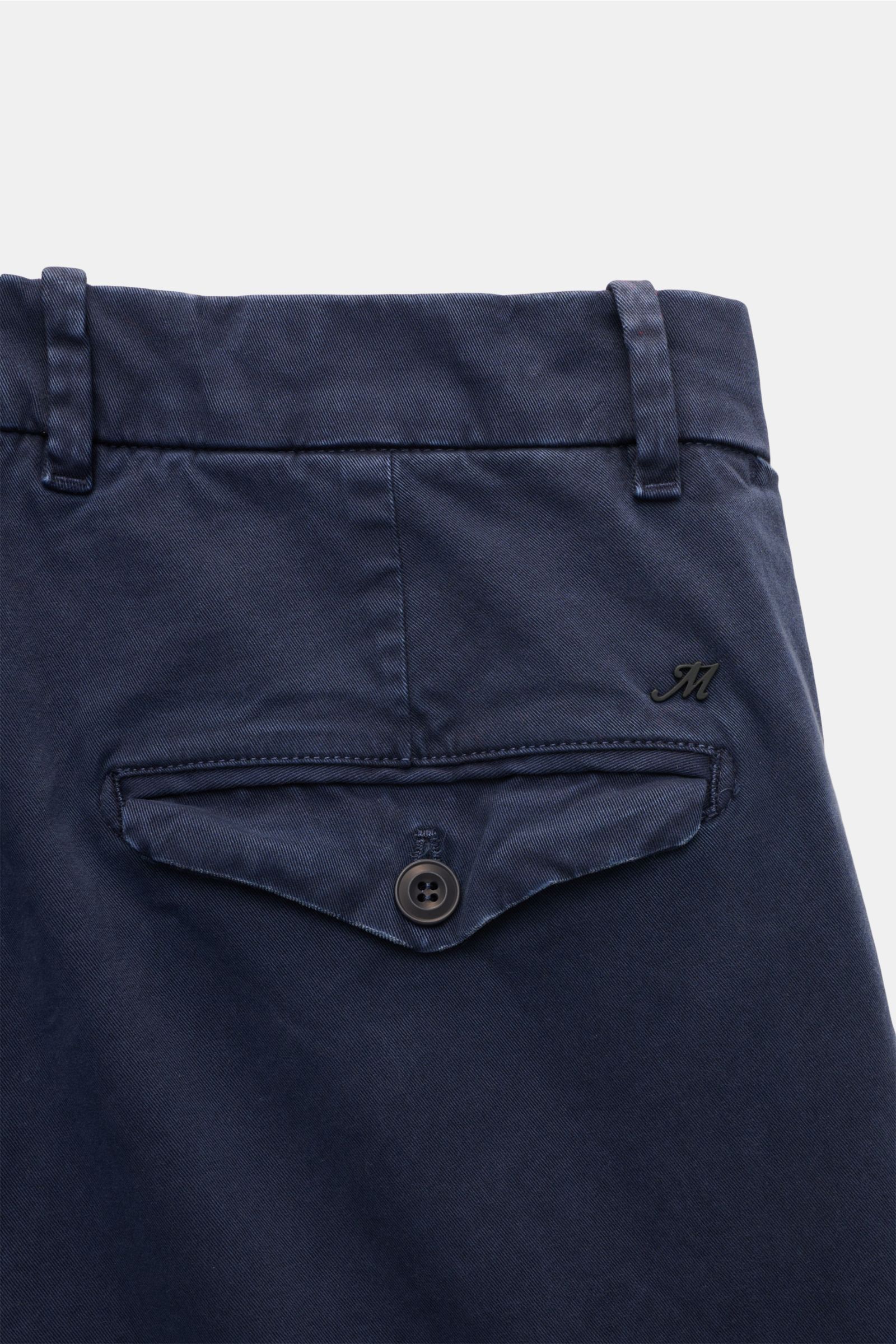 Close-up rear view of Mason's Chino 'Boston Style' navy featuring twill cotton, lightly elastic, soft touch, garment dyed, Regular Fit, slightly tapered, zip fly and button, French pockets, coin pocket, and buttoned flap back pockets.