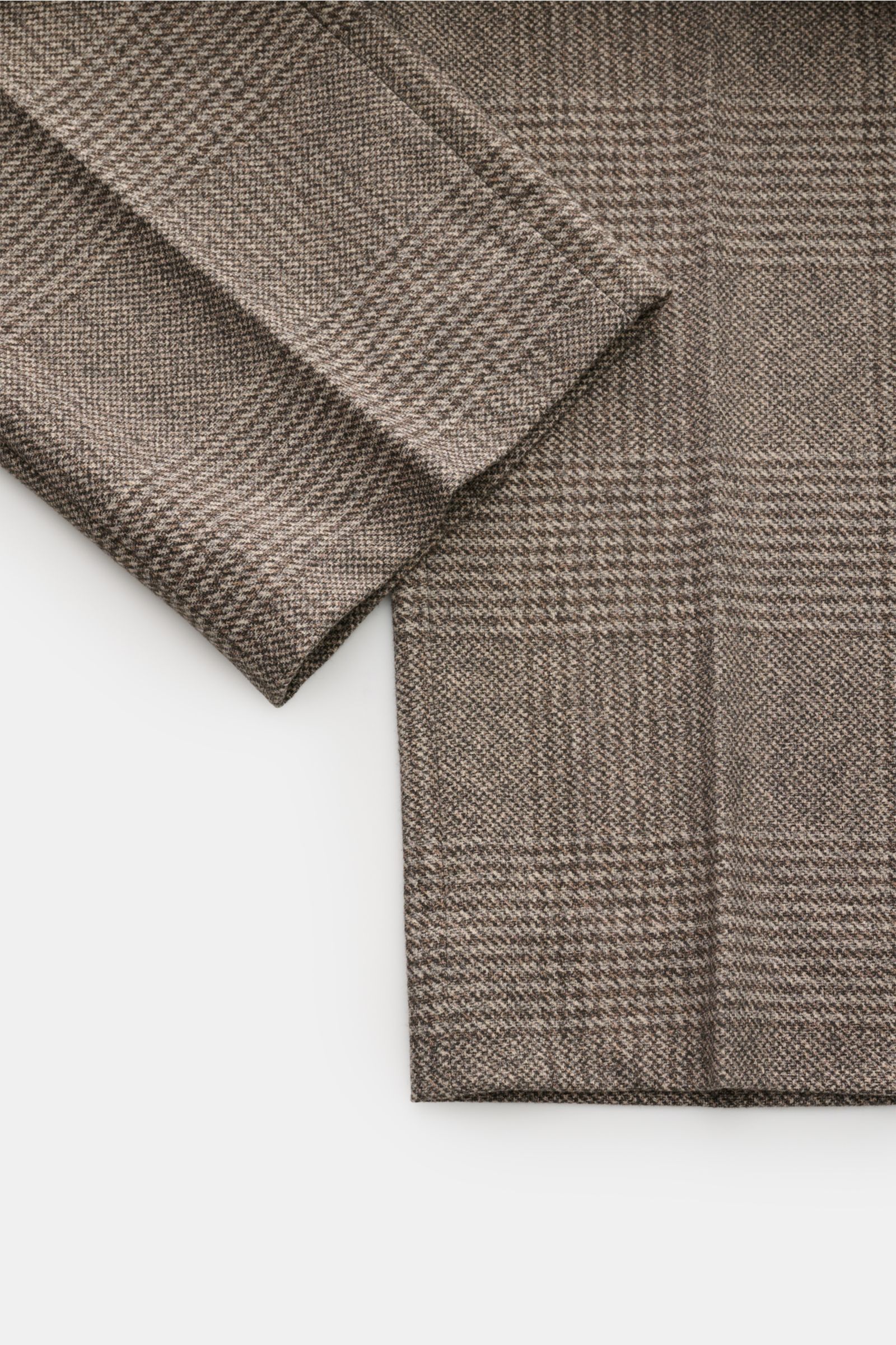 Nahaufnahme der Circolo 1901 Hose beige/braun kariert mit Glencheck-Print, Regular Fit, Baumwoll-Jersey, hohem Stretch, schmal zulaufend, fotografiert von oben.