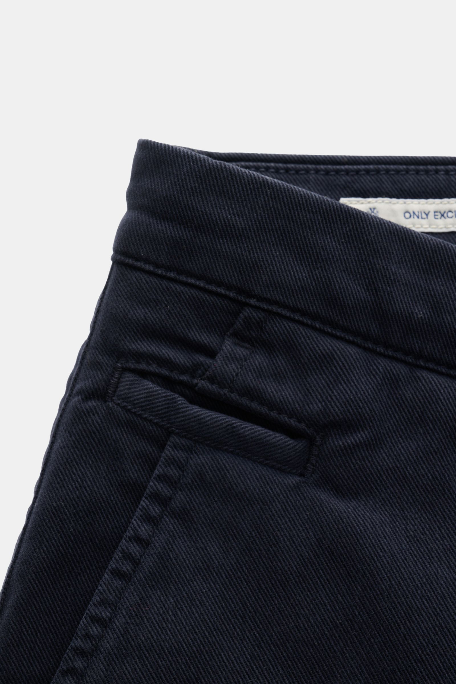 Close-up front-left view of Jacob Cohen Chino 'Bobby' navy in slim fit cotton and lyocell twill with elastic quality, soft touch, and garment-dyed finish.