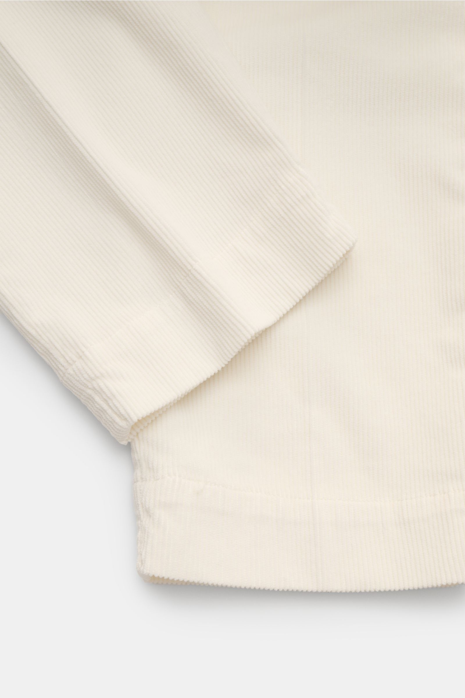 Alt tag (125 characters max): Close-up top-side view of cream corduroy fabric showing texture and hem of 04651/ A trip in a bag Corduroy trousers cream.

Description:
Welcome to the Autumn Winter Collection by 04651/ A TRIP IN A BAG – inspired by Finla