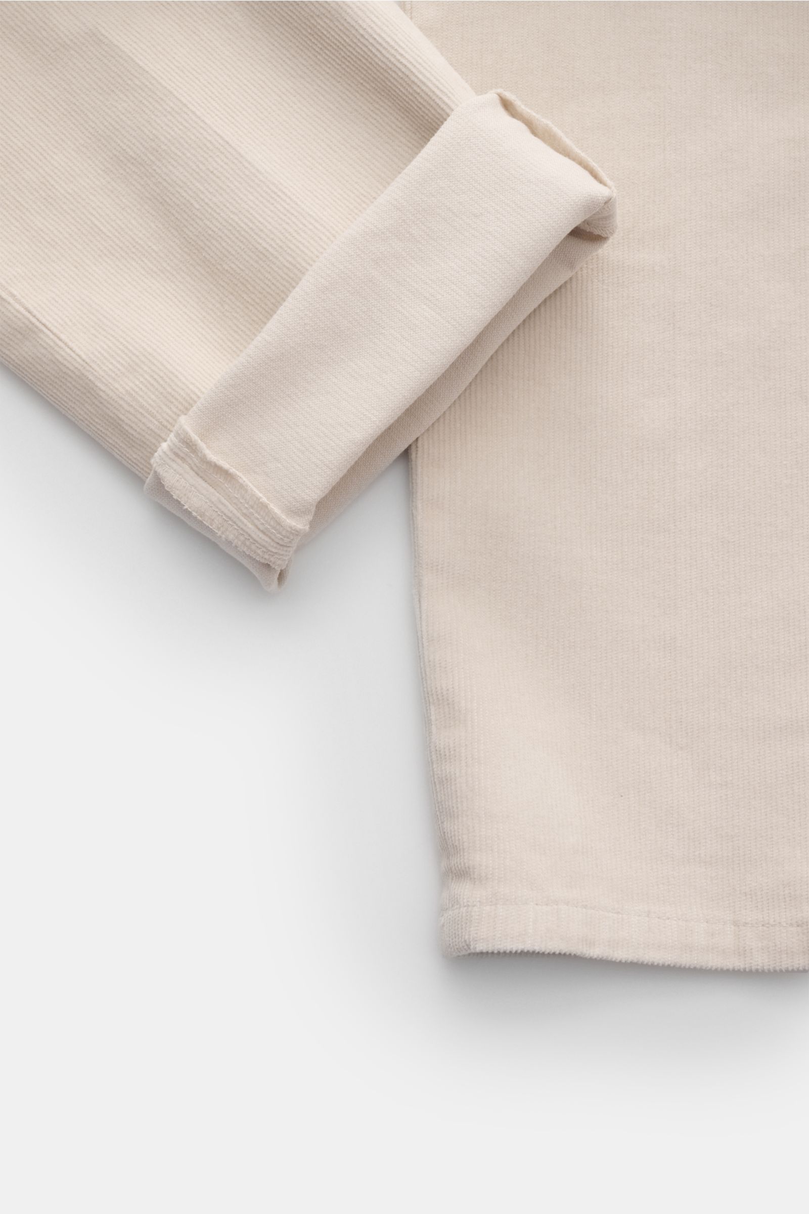 Dondup Cordhose 'Gaubert' creme, moderne Slim Fit Cordhose aus feiner Baumwolle mit leichtem Stretch, schmal zulaufend, Detailaufnahme vom Saum.