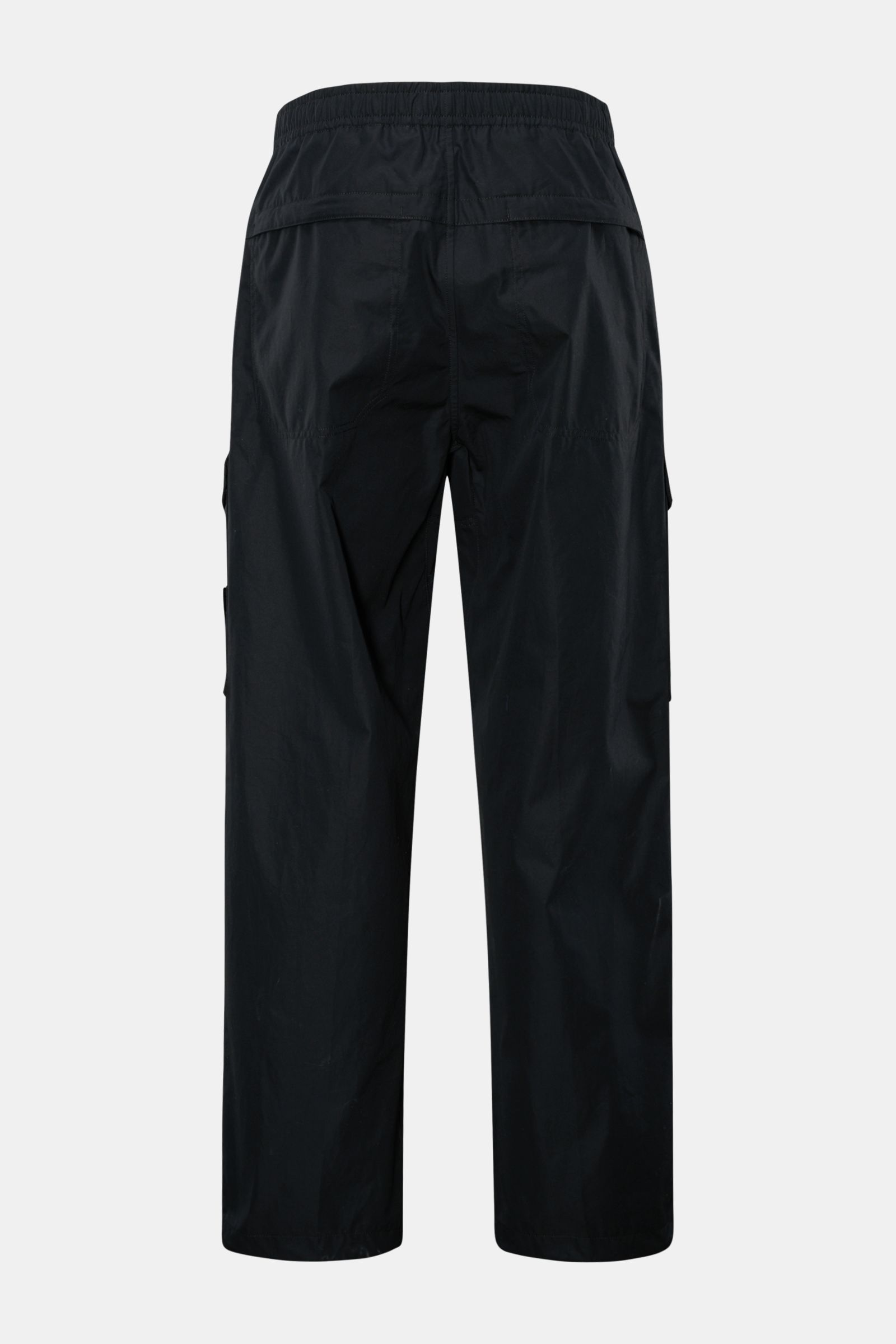 Stone Island Cargohose 'Ghost Piece' dark navy shown from the back, loose fit cargo pants in garment-dyed cotton poplin with elastic waistband, tonal compass badge, French pockets, cargo pockets, buttoned back pockets, and adjustable leg cuffs; monochrome