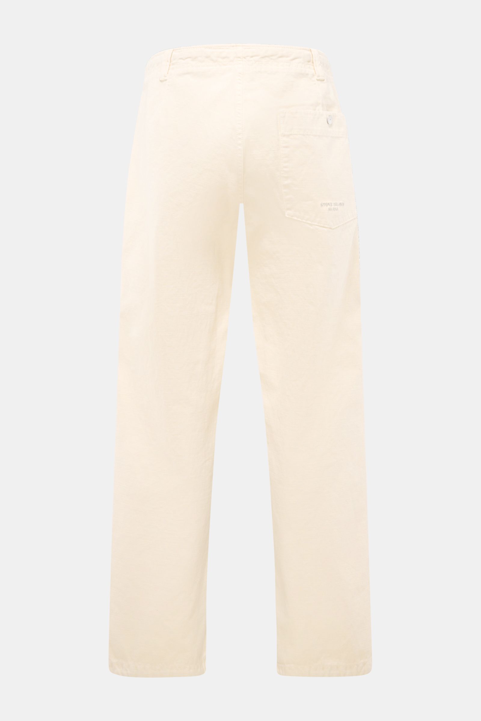 Stone Island Cargohose 'Marina' creme shown from the back, made of pure cotton with regular fit, button fly, cargo pocket, and adjustable leg cuffs. Maritime Utility-Ästhetik: Die Cargohose aus der 'Marina'-Kollektion von STONE ISLAND vereint funktionale 