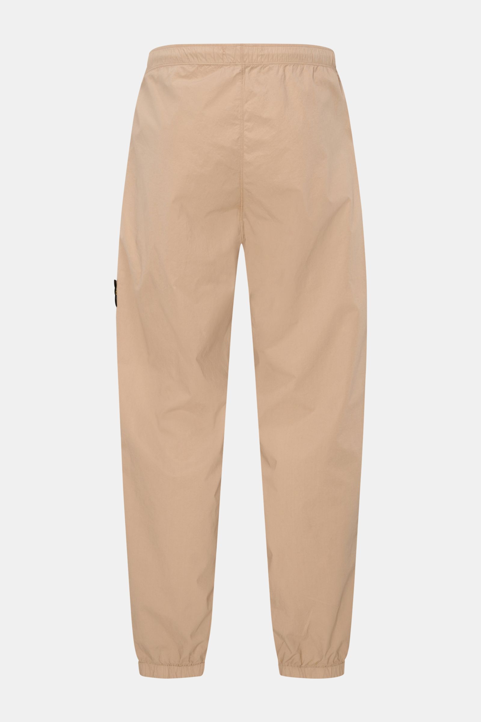 Stone Island Jogpants sand, Rückansicht, knöchellang, elastische Baumwolle, Tapered Fit, elastischer Bund mit Tunnelzug, Kompass-Badge.