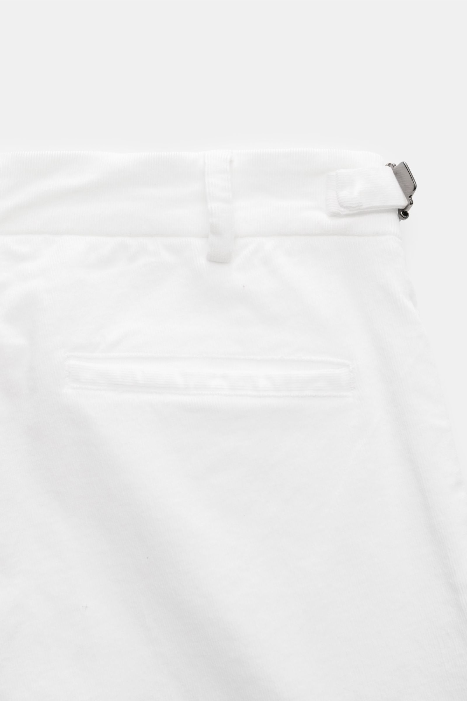 Close-up rear view of 04651/ A trip in a bag Corduroy trousers off-white, made of slightly stretchy cotton corduroy with side adjusters and double pleat.
