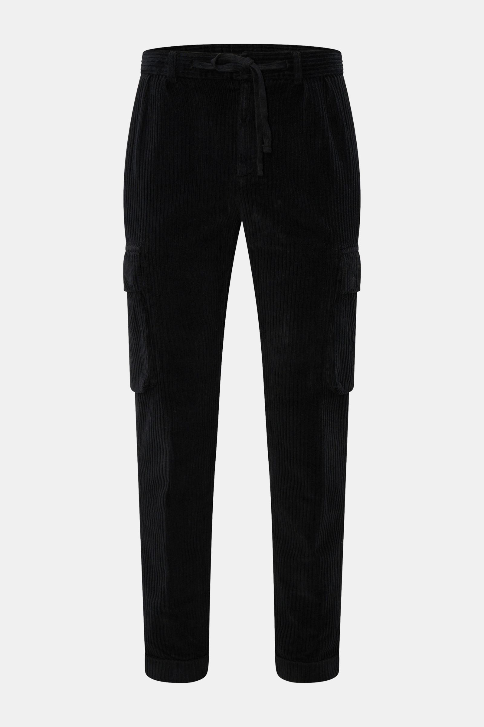 Front view of 04651/ A trip in a bag Corduroy cargo pants black, wide wale cotton corduroy with slight stretch, soft feel, tapered fit, regular thigh width, ankle length, zip and waist button, partially elasticated waistband with drawstring, French and hi