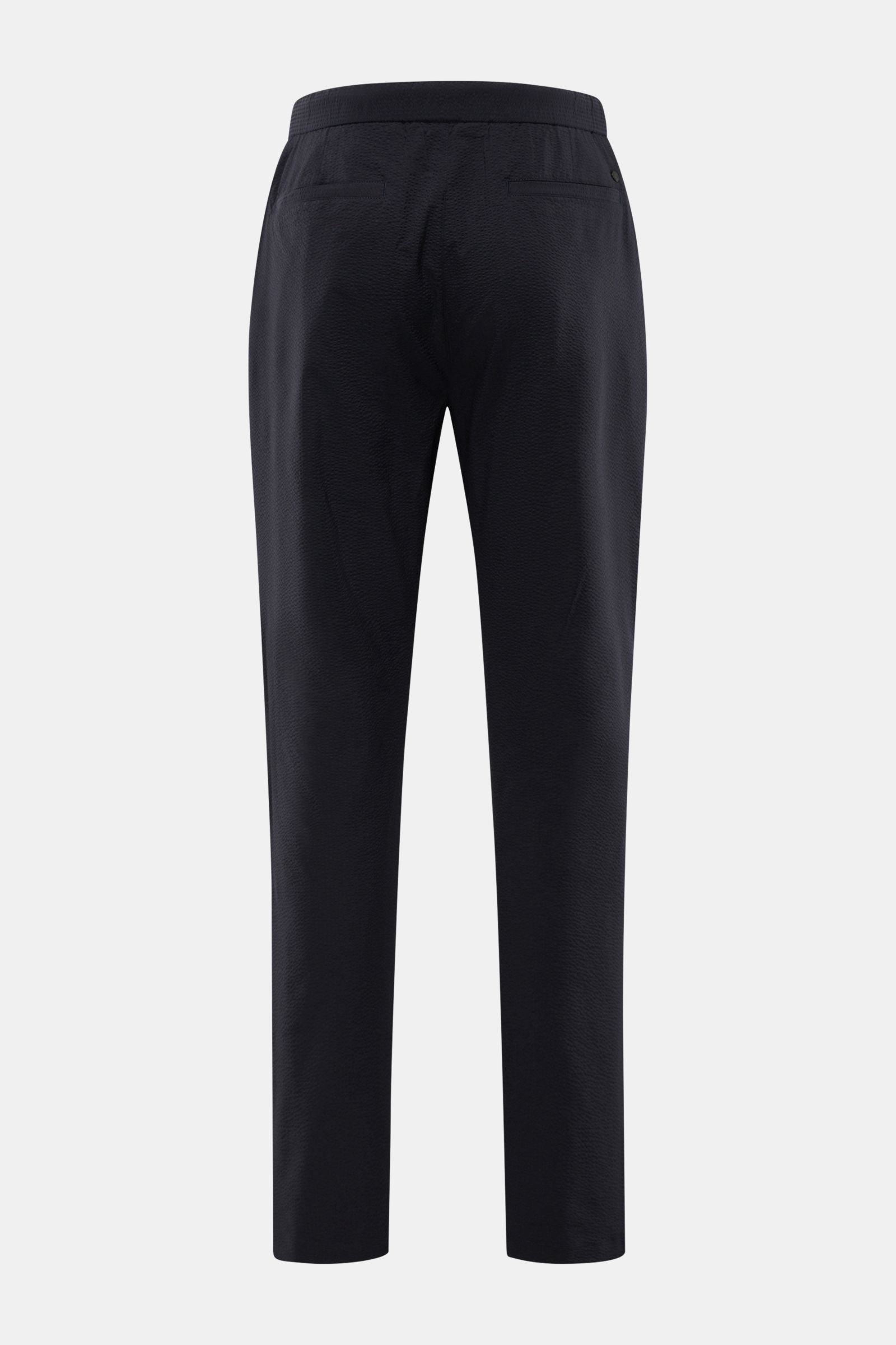 Closed Jogpants 'Vigo' dark navy in schmal zulaufendem Tapered Fit, rückseitig mit paspelierten Taschen aus sommerlichem Seersucker.