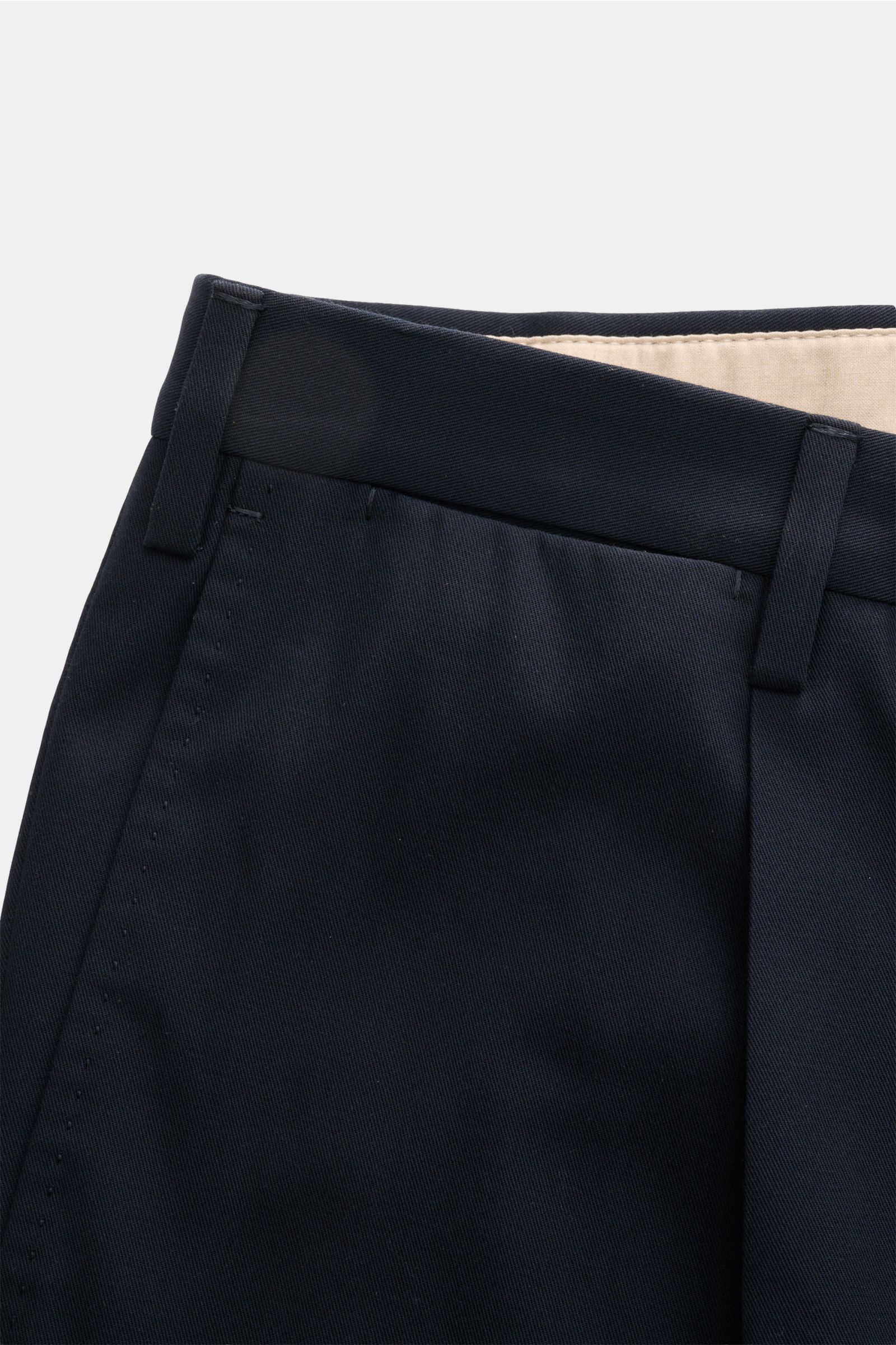 Incotex Cotton trousers navy shown from close-up front waist, pure cotton with regular fit, single pleat, extended buttoned tab, French pockets.