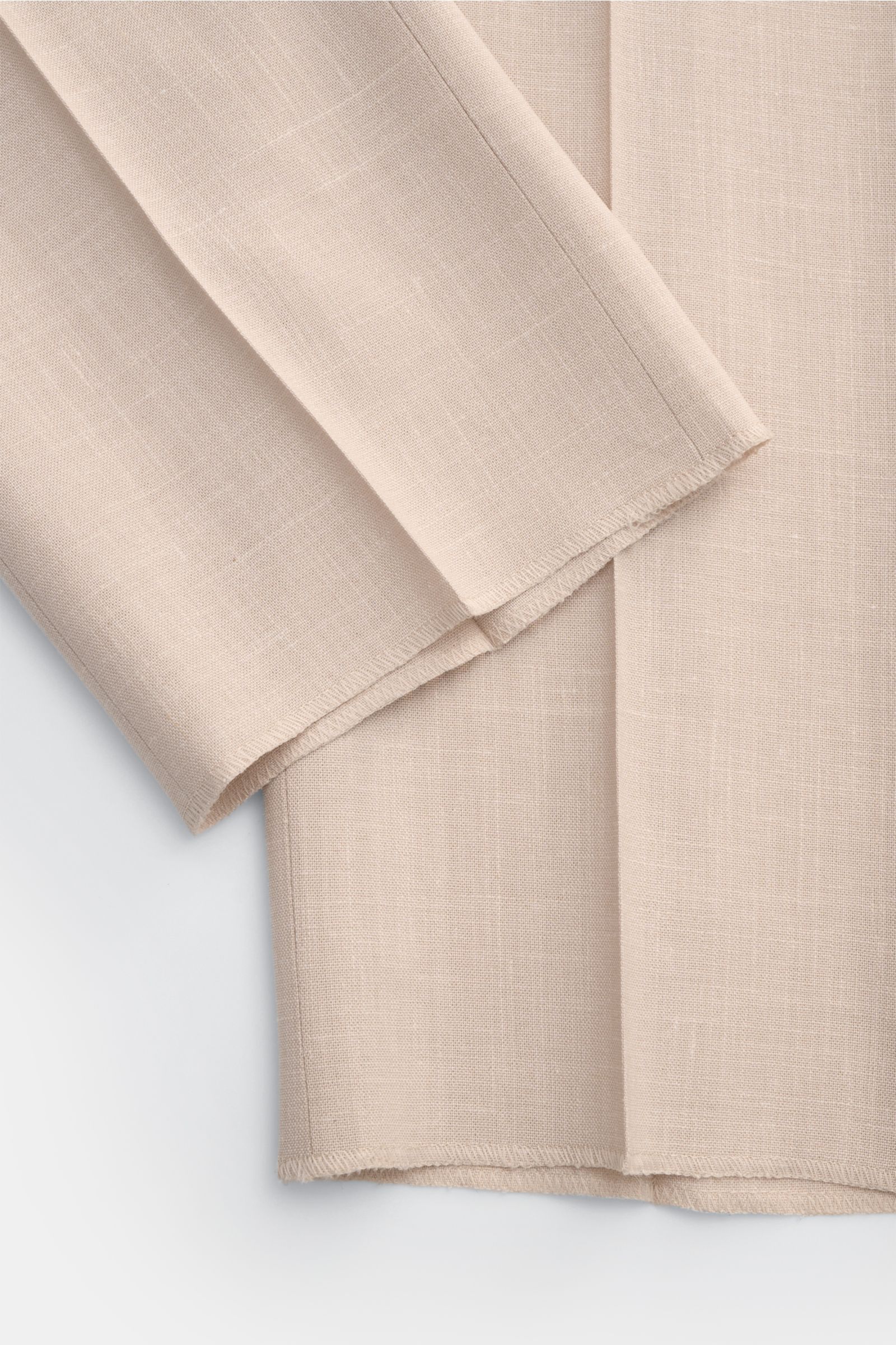 Alt-Tag (124 Zeichen): Nahaufnahme der Incotex Jogpants beige meliert aus Wolle-Seide-Leinen-Mix, Regular Fit, elastischem Bund und Tunnelzug, offen.