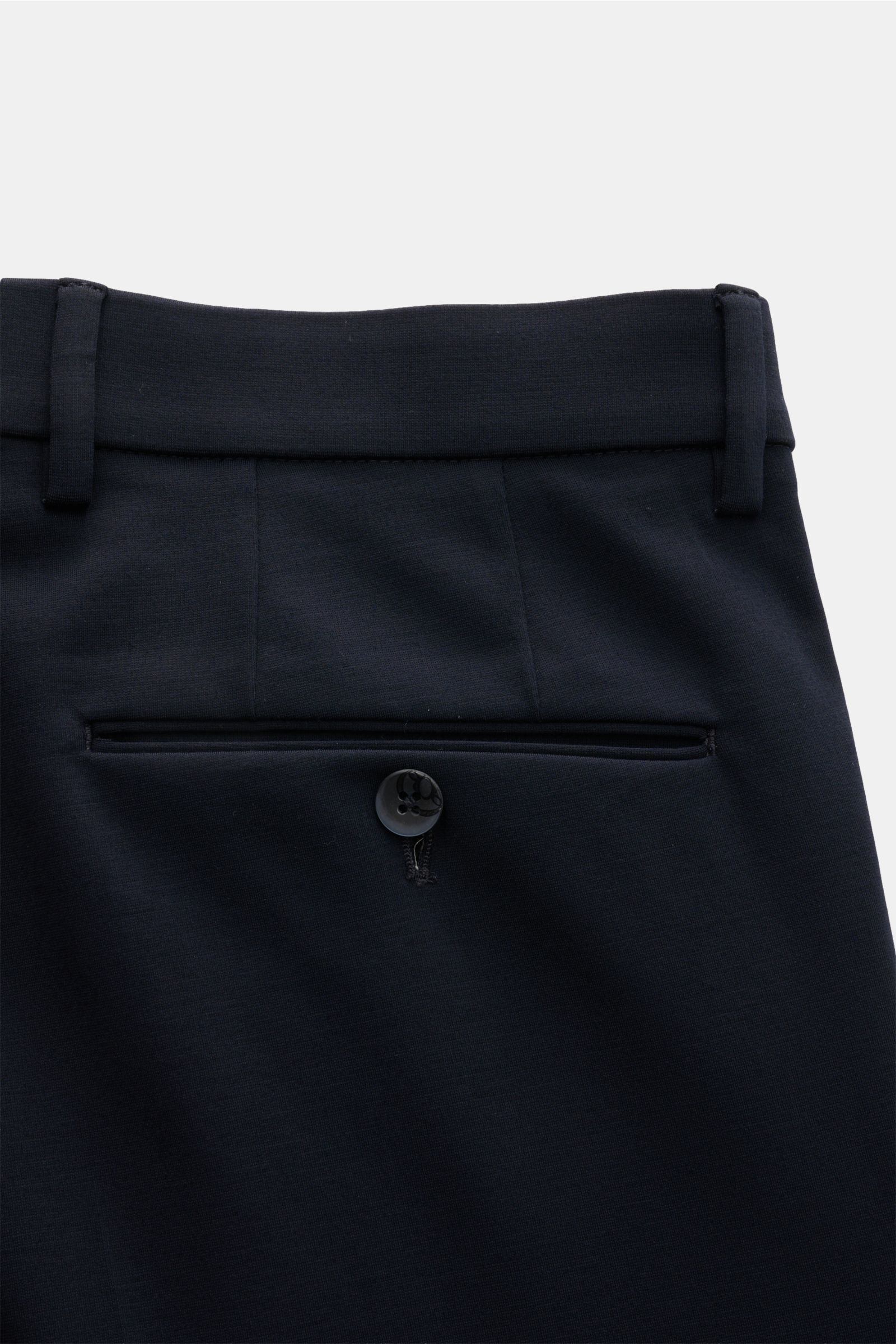 Close-up rear view of GTA Jersey trousers 'Federico' navy showing jetted back pocket with button, elastic waistband, and soft jersey fabric. For casual office looks: The jersey trousers 'Federico' by GTA combine maximum comfort with timeless elegance to m
