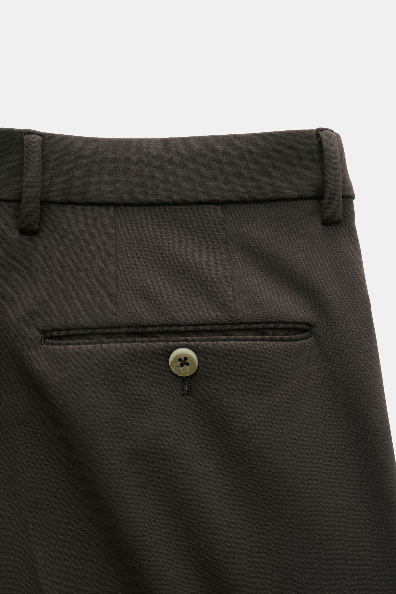 Back close-up view of GTA Jersey trousers 'Federico' dark brown showing elastic waistband, single pleat, French pockets, and jetted back pocket with button, made of soft jersey viscose microfiber. For casual office looks: The jersey trousers 'Federico' by