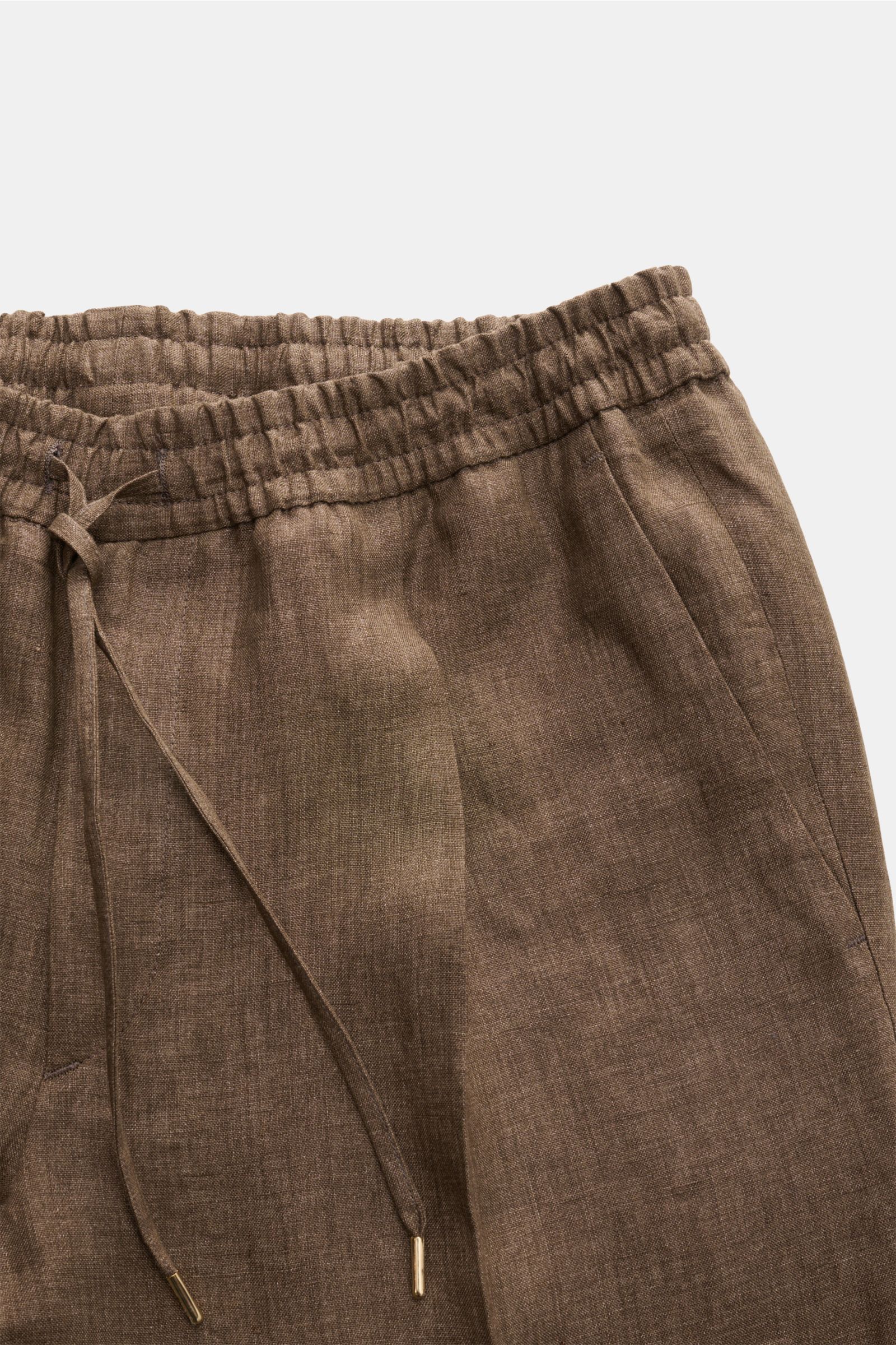 Briglia 1949 Jogger pants 'Wimbledon' brown mottled shown from a top-front close-up, featuring elasticated waistband, drawstring, and linen fabric. 

Add some Italian flair to your wardrobe with the casual jogger pants 'Wimbledon' from the label BRIGLI