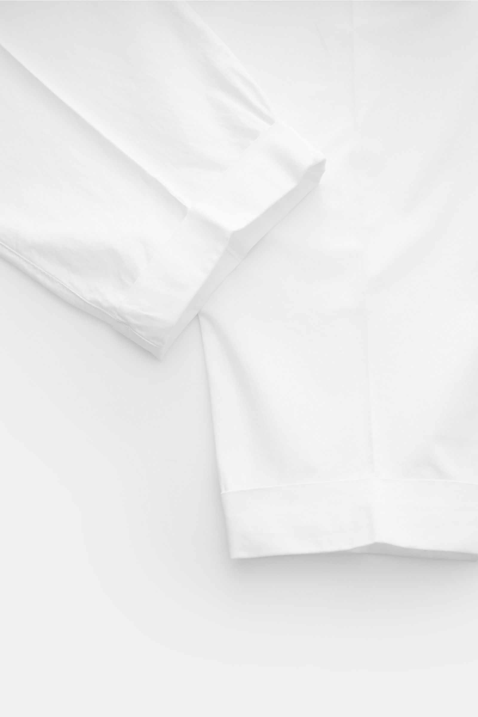 Dondup Baumwollhose 'Mel' weiß, knöchellang mit einfacher Bundfalte, französischen Taschen, Reißverschluss, Slide Button, Metall-Initial, weicher Griff.