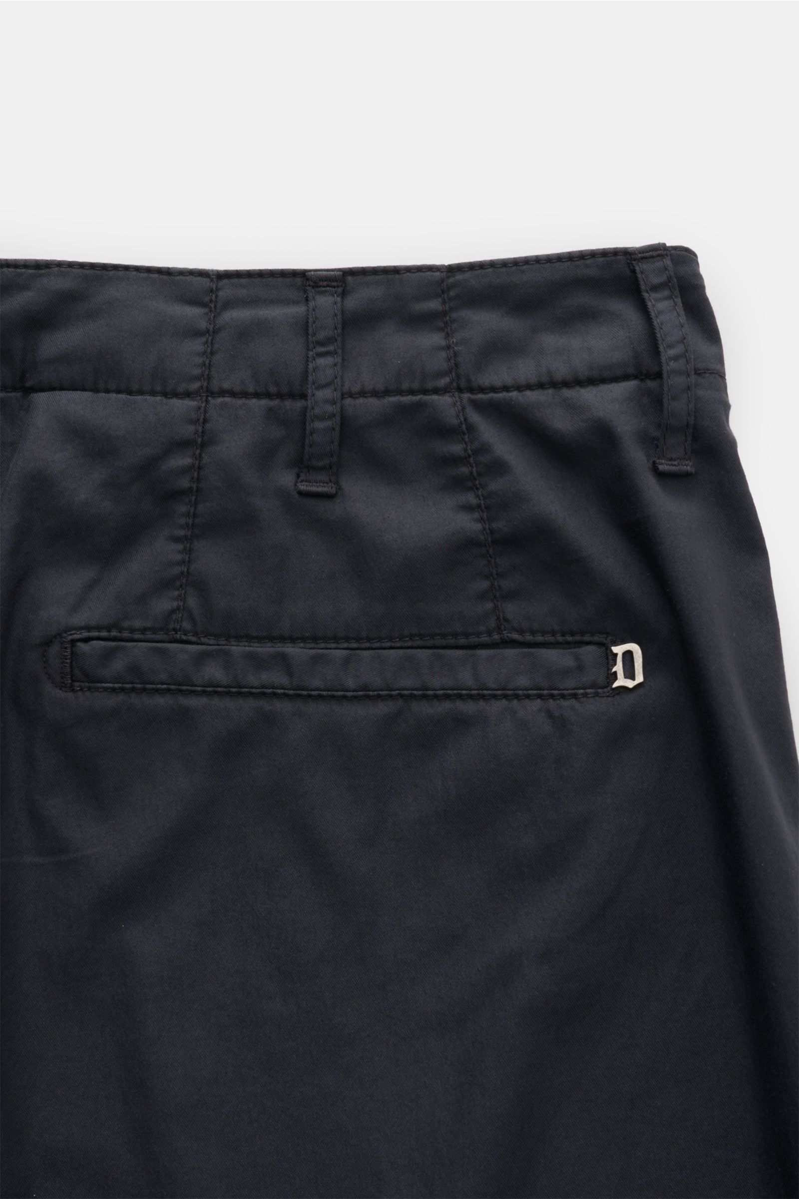 Back view close-up of Dondup Chino 'Zyan' dark navy, slim fit with elastic cotton-microfiber blend, soft touch, tapered short cut, zip and button, French and welt pockets with metal initial.