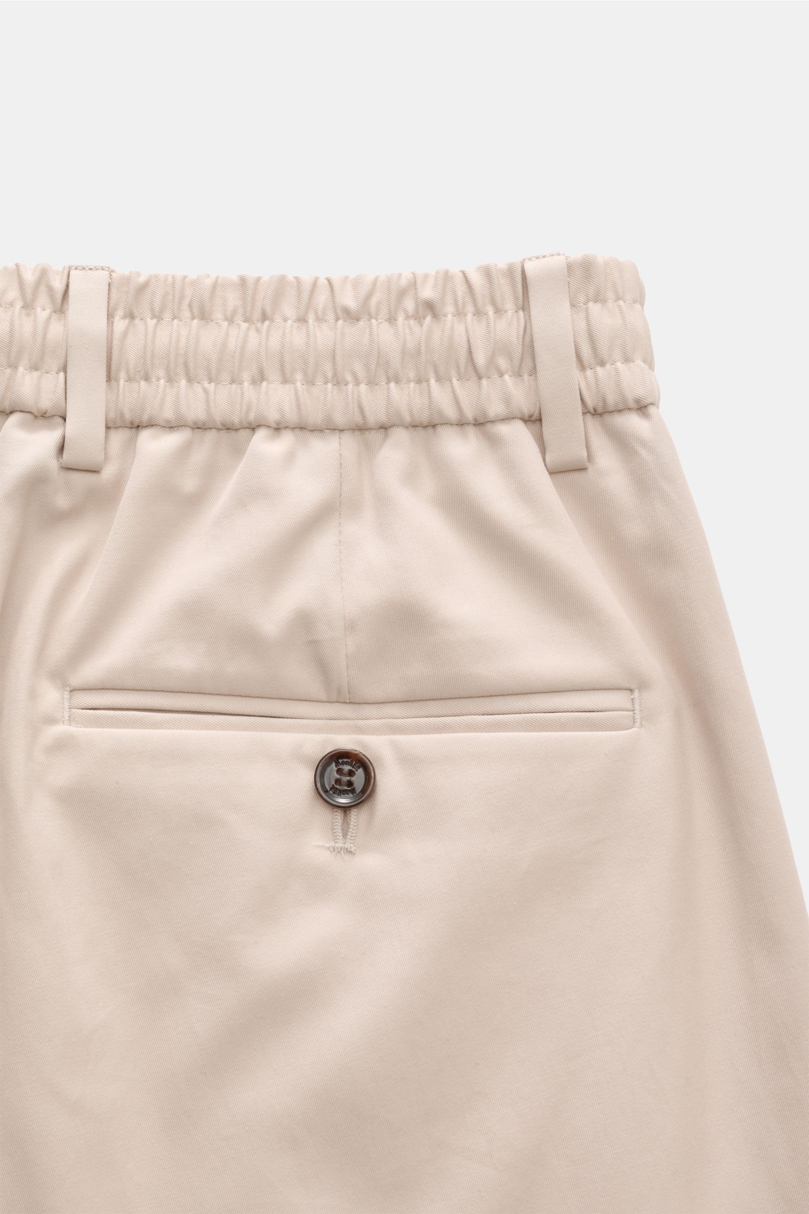 Close-up rear view of Moorer Jogger pants 'Anton' beige in lightweight cotton twill, showing partially elasticated waistband, back pocket with button, and soft fabric.