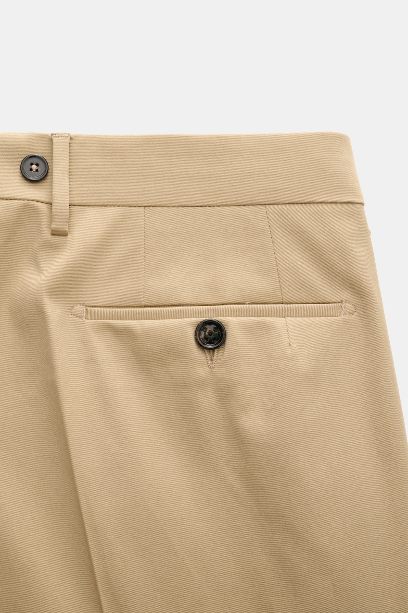 Berwich Chino 'Barber' beige shown from a close-up rear angle, featuring cotton twill fabric, slight stretch, double waistband pleats, side seam and welt pockets, button closure with extended button placket, and buttons for suspenders on the waistband.