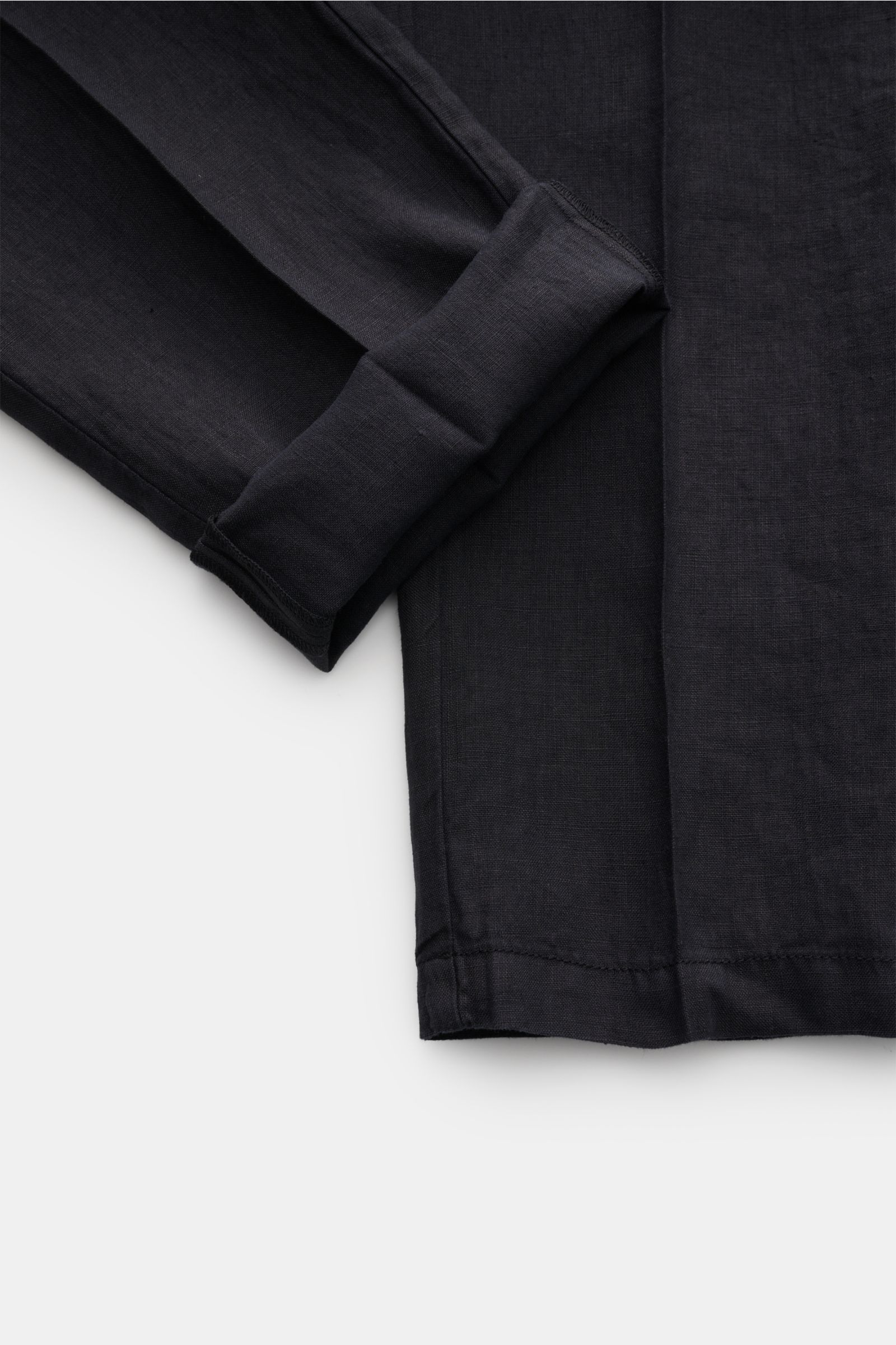 Altea Linen jogger pants 'Mattia' dark navy shown from above, highlighting lightweight pure linen fabric, tapered fit, elasticated waistband, and ankle length. Casual luxury for warm days: The jogger pants 'Mattia' in pure linen by ALTEA are the perfect s