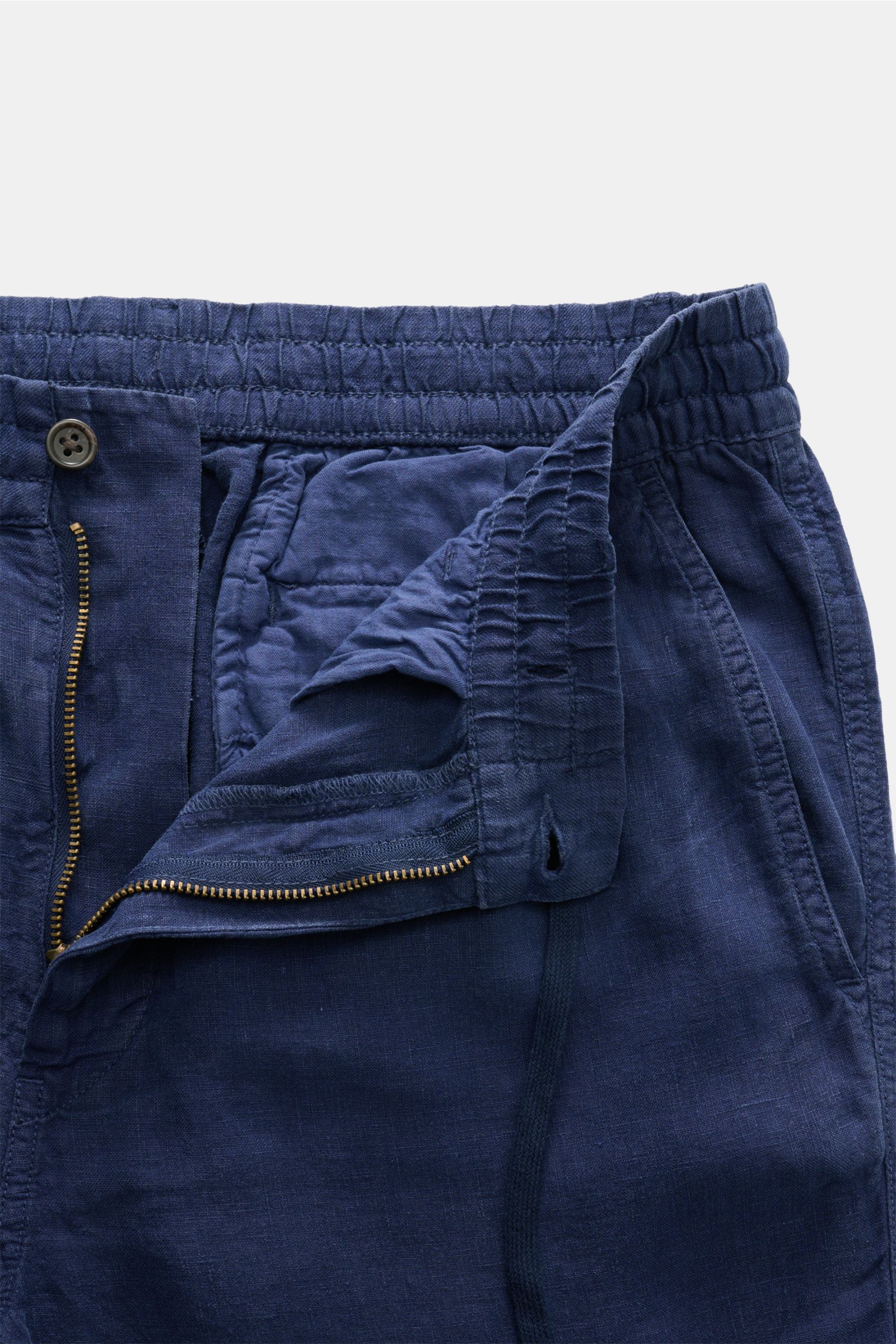 Nahaufnahme der geöffneten Taille der Polo Ralph Lauren Leinenhose navy aus reinem Leinen, elastischem Bund mit Tunnelzug, Reißverschluss, Bundknopf und französischen Taschen.