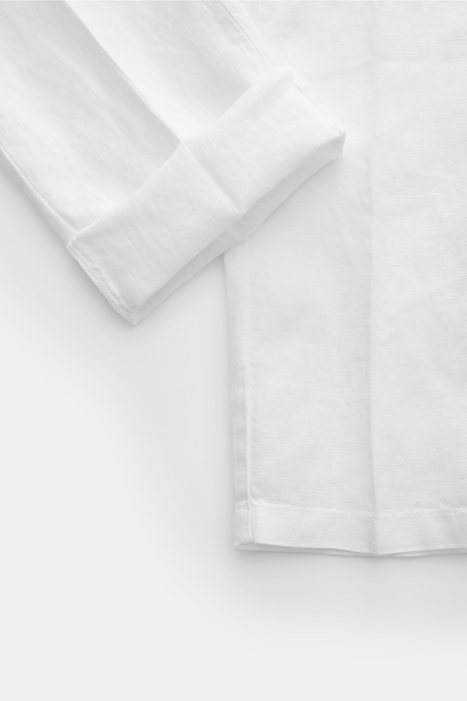 04651/ A trip in a bag Leinen-Jogpants 'Linen Pants' weiß, Detailfoto von unten, reines Leinen, Tapered Fit, elastischer Bund, französische Taschen.