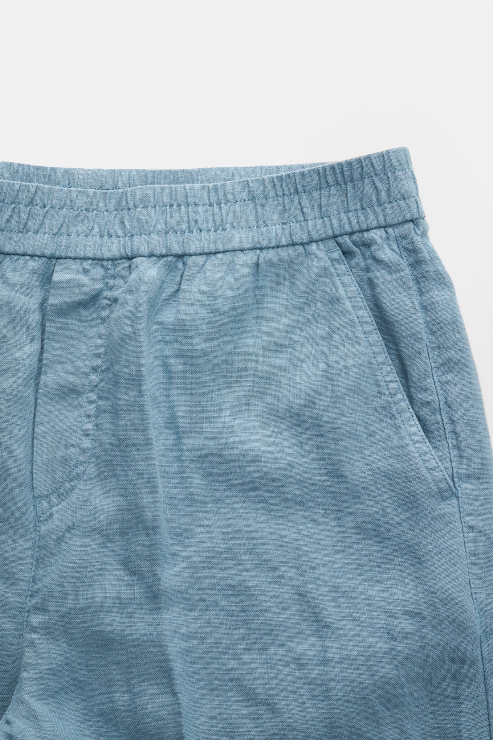 04651/ A trip in a bag Leinen-Jogpants 'Linen Pants' rauchblau, Detailfoto von oben, elastischer Bund, französische Taschen, reine Leinenstruktur.