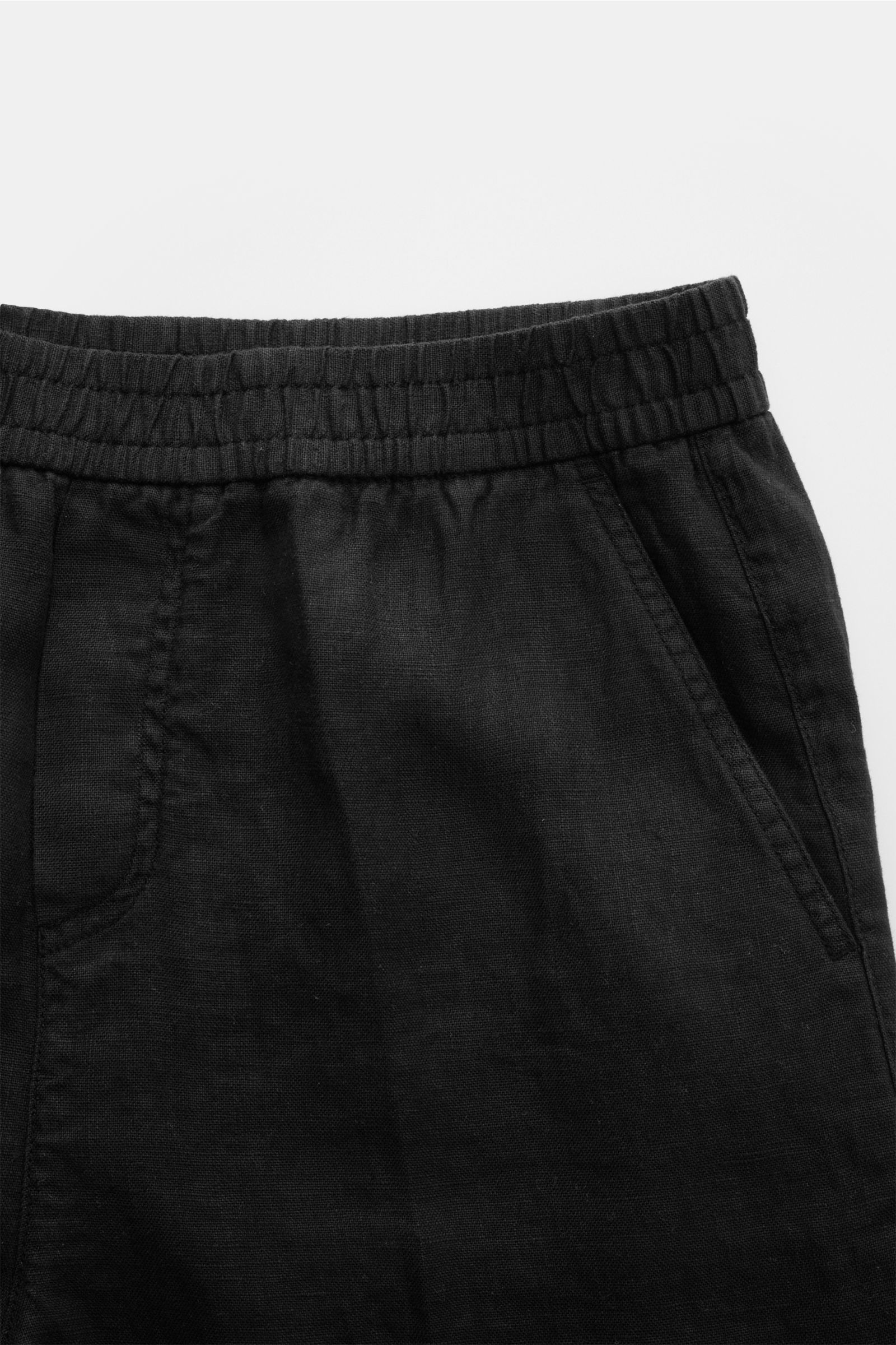 Schwarze 04651/ A trip in a bag Leinen-Jogpants 'Linen Pants' in Nahaufnahme von oben, elastischer Bund, französische Taschen, reine Leinenqualität.