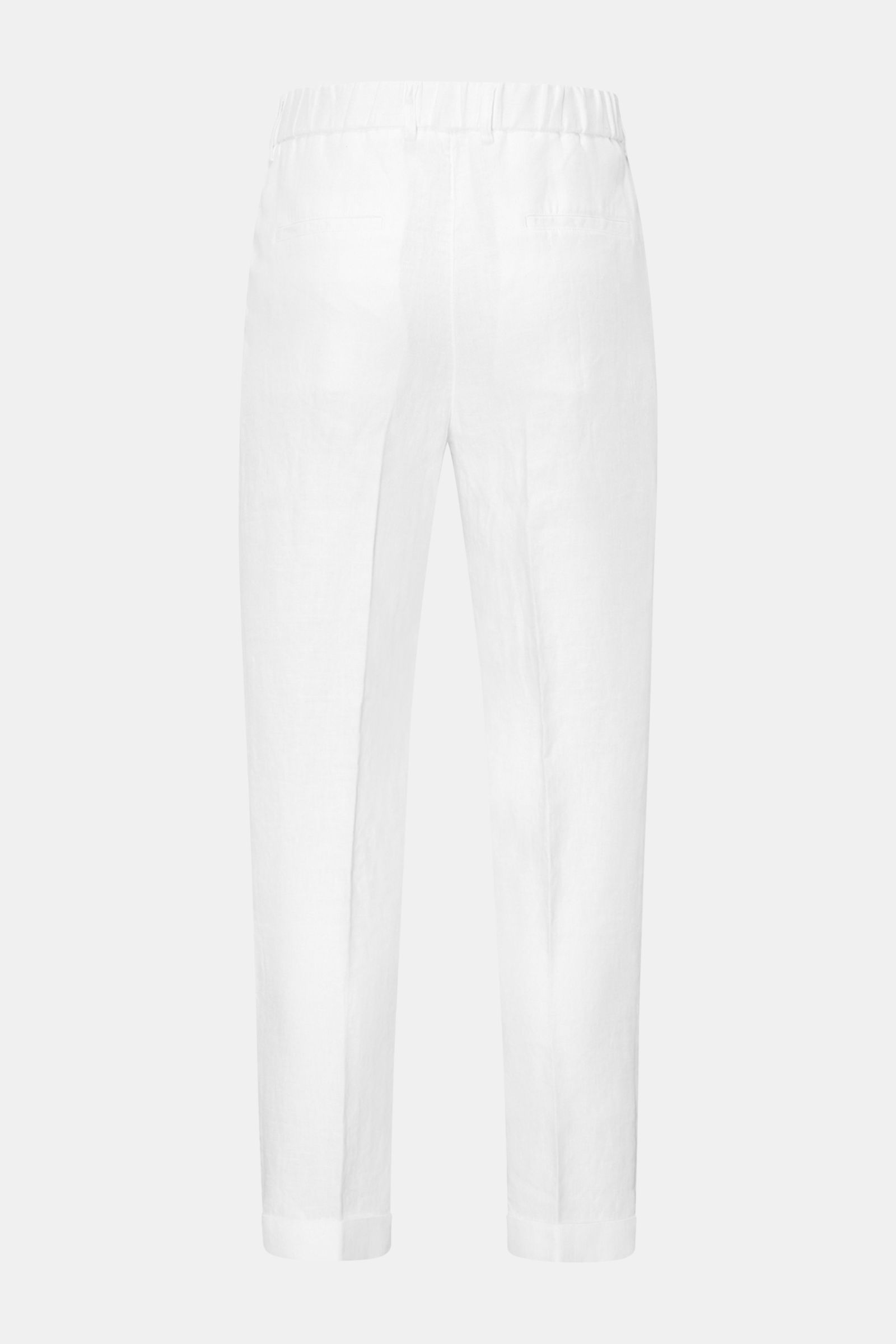Rear view of 04651/ A trip in a bag Linen jogger pants 'Linen Pants' white, pure linen, regular fit, tapered short cut with zip and button.

Description: Perfect for warm days: These linen jogger pants by 04651/ A TRIP IN A BAG are the ideal summer ess