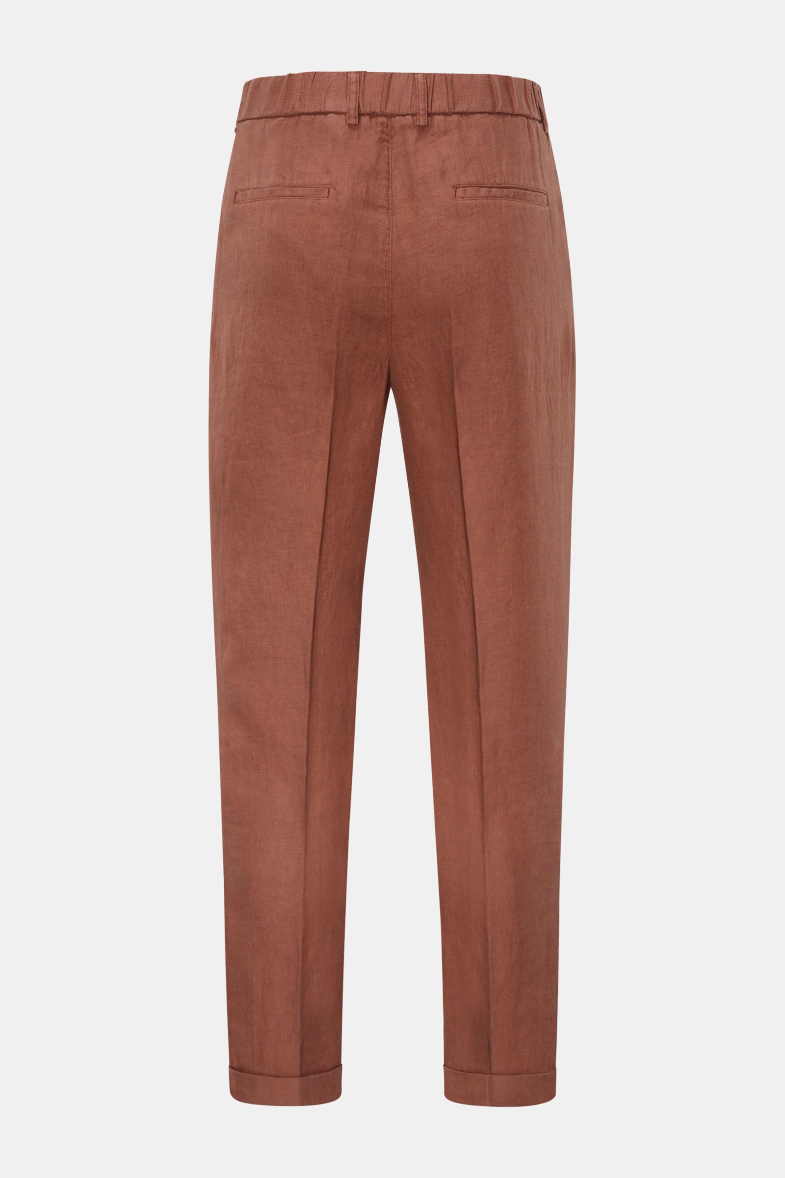 Rear view of 04651/ A trip in a bag Linen jogger pants 'Linen Pants' rust brown in pure linen, regular fit, tapered and short cut, with elasticated waistband, drawstring, zip and button, featuring French and jetted back pockets, and signature material tex