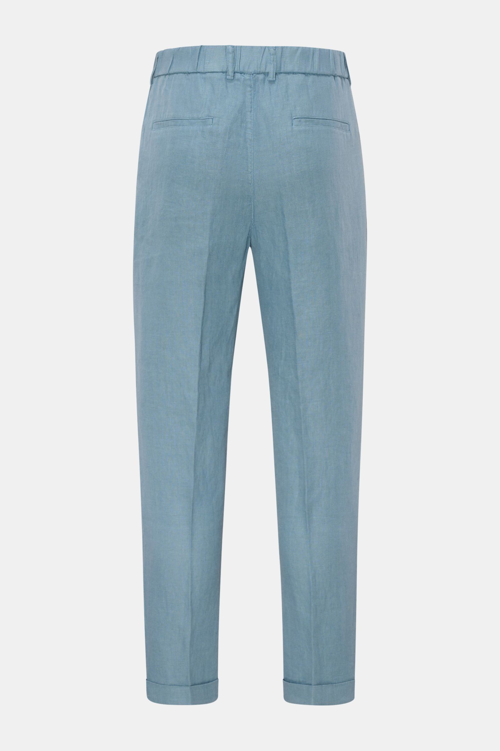 Back view of 04651/ A trip in a bag Linen jogger pants 'Linen Pants' smoky blue in pure linen with tapered, short cut and partially elasticated waistband.

Perfect for warm days: These linen jogger pants by 04651/ A TRIP IN A BAG are the ideal summer e