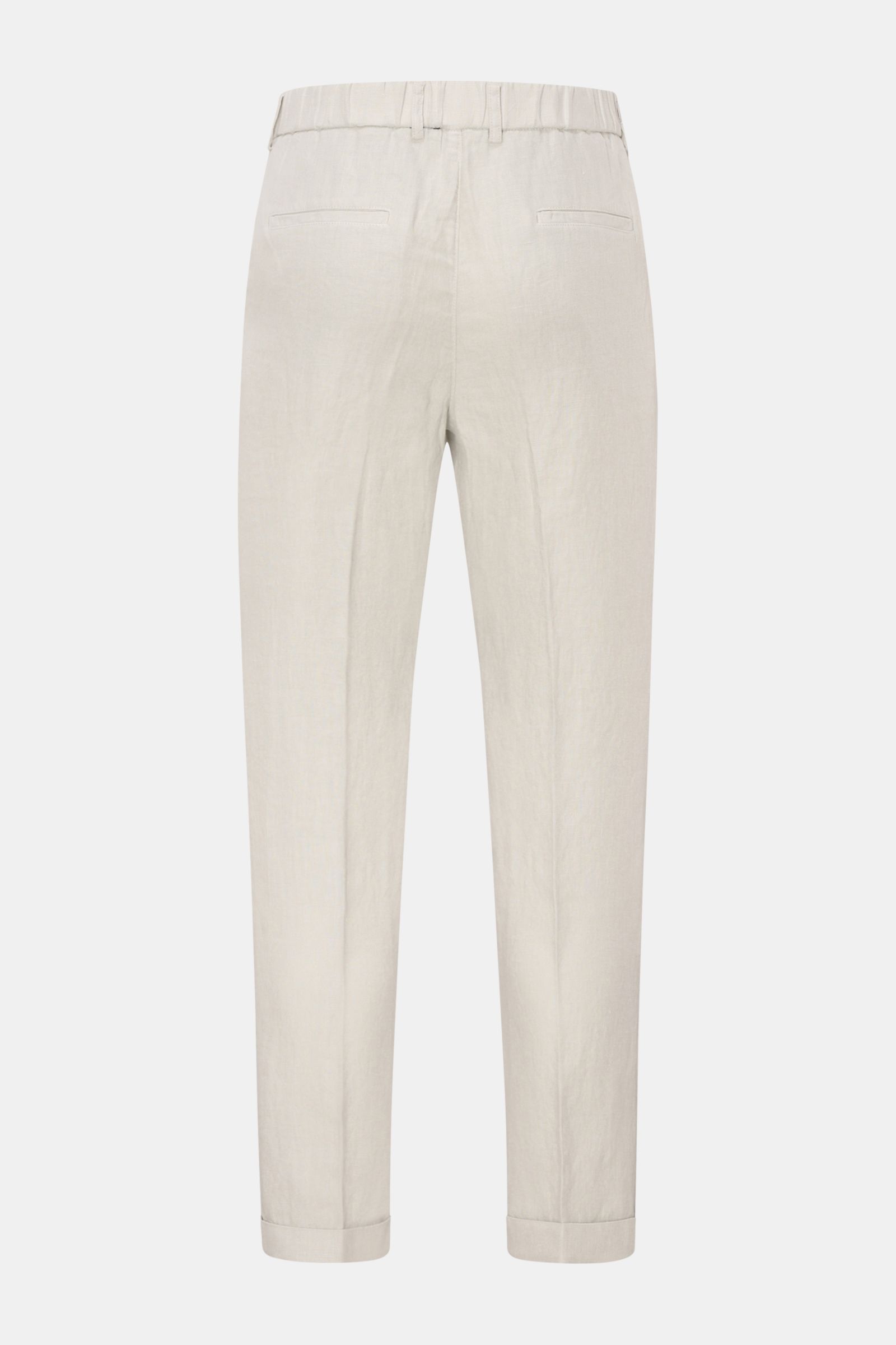 Rear view of 04651/ A trip in a bag Linen jogger pants 'Linen Pants' light grey, showcasing tapered, short cut with elasticated waistband.

Description: Perfect for warm days: These linen jogger pants by 04651/ A TRIP IN A BAG are the ideal summer esse