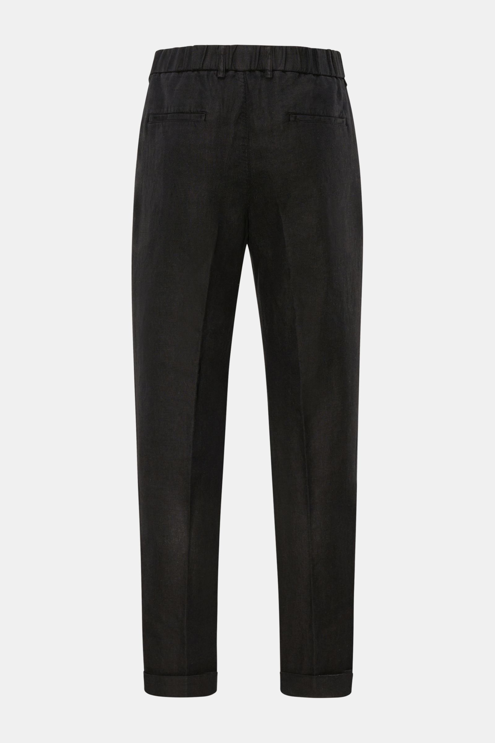 Rear view of 04651/ A trip in a bag Linen jogger pants 'Linen Pants' black, made of pure linen with tapered, short, regular fit.

Perfect for warm days: These linen jogger pants by 04651/ A TRIP IN A BAG are the ideal summer essential – for travel or f