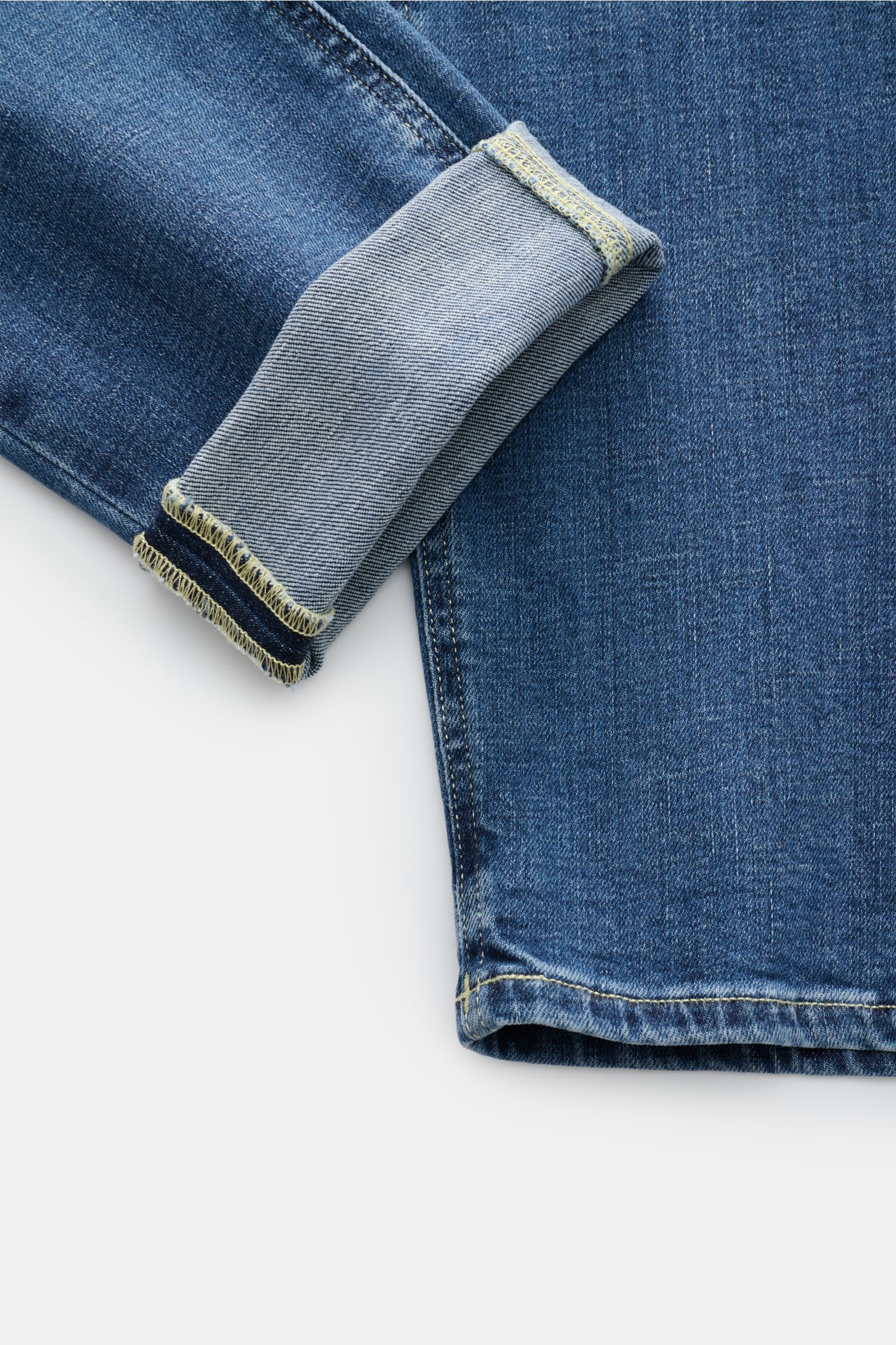 Dondup Jeans 'George' blau, Detailaufnahme vom unteren Bein mit Umschlag, Denim aus Baumwolle, leichter Stretch, Skinny Fit, authentische Waschung.