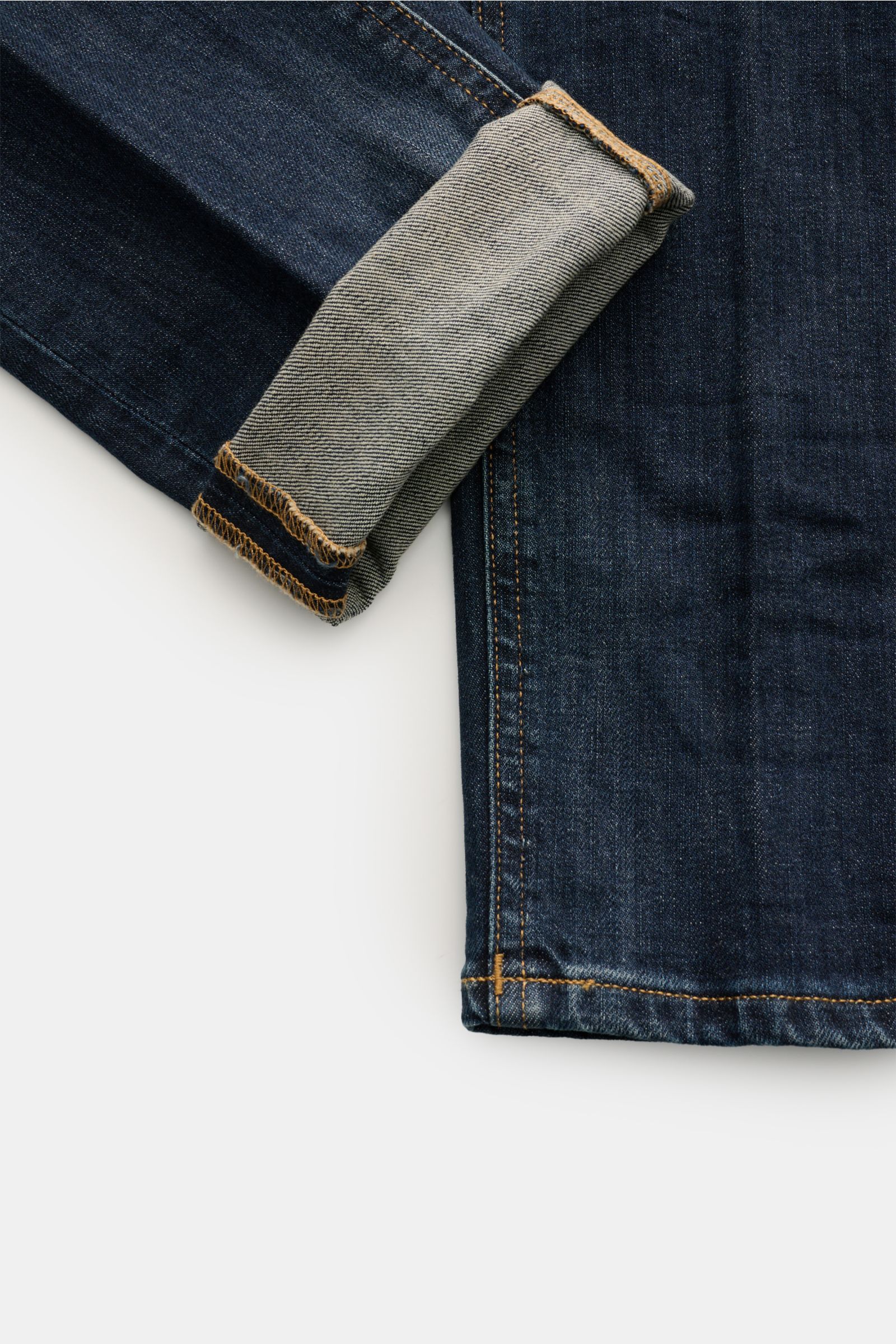 Dondup Jeans 'George' dunkelblau, Detailansicht Beinende mit umgeschlagenem Saum, Denim aus Baumwolle, elastisch, weicher Griff, Skinny Fit, niedrige Bundhöhe.