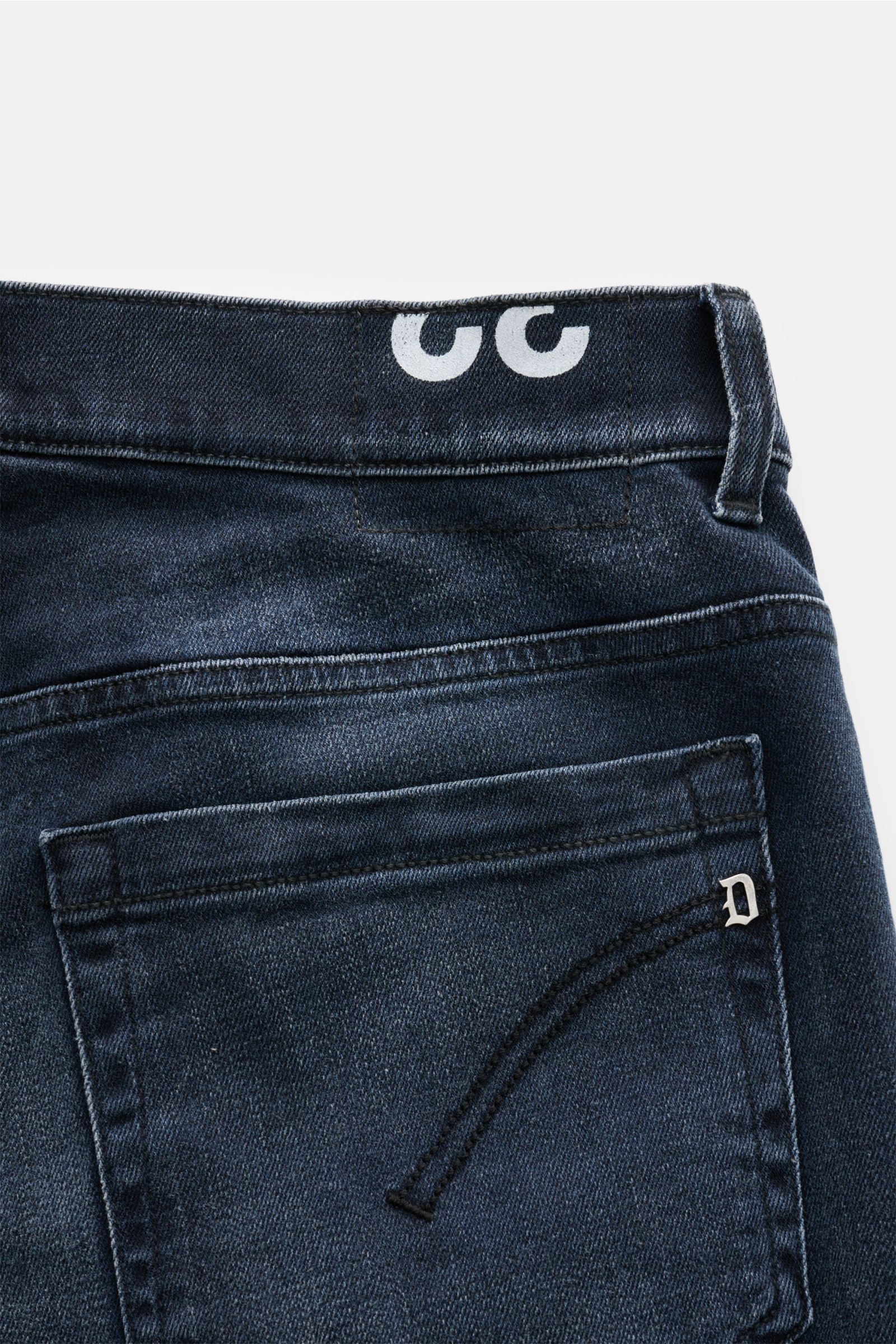 Back view close-up of Dondup Jeans 'George' grey-blue showing the low waist, back pocket with stitching, signature metal initial, and belt loop. Casual all-rounder: The jeans 'George Skinny Fit' by DONDUP, made of slightly stretchy cotton material, are a 