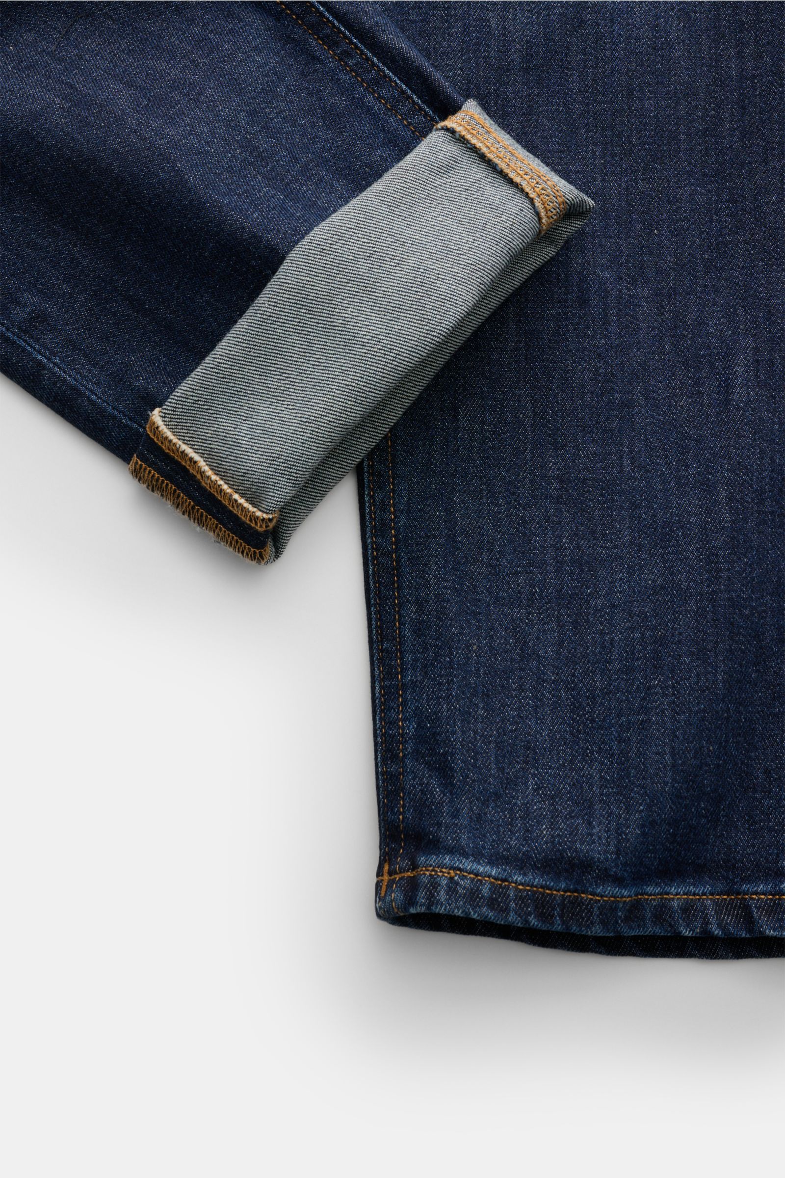 Dondup Jeans 'Jeff' navy Detailfoto von unten mit umgeschlagenem Bein, Denim aus Baumwolle, leicht elastisch, Carrot Fit, knöchellang.
