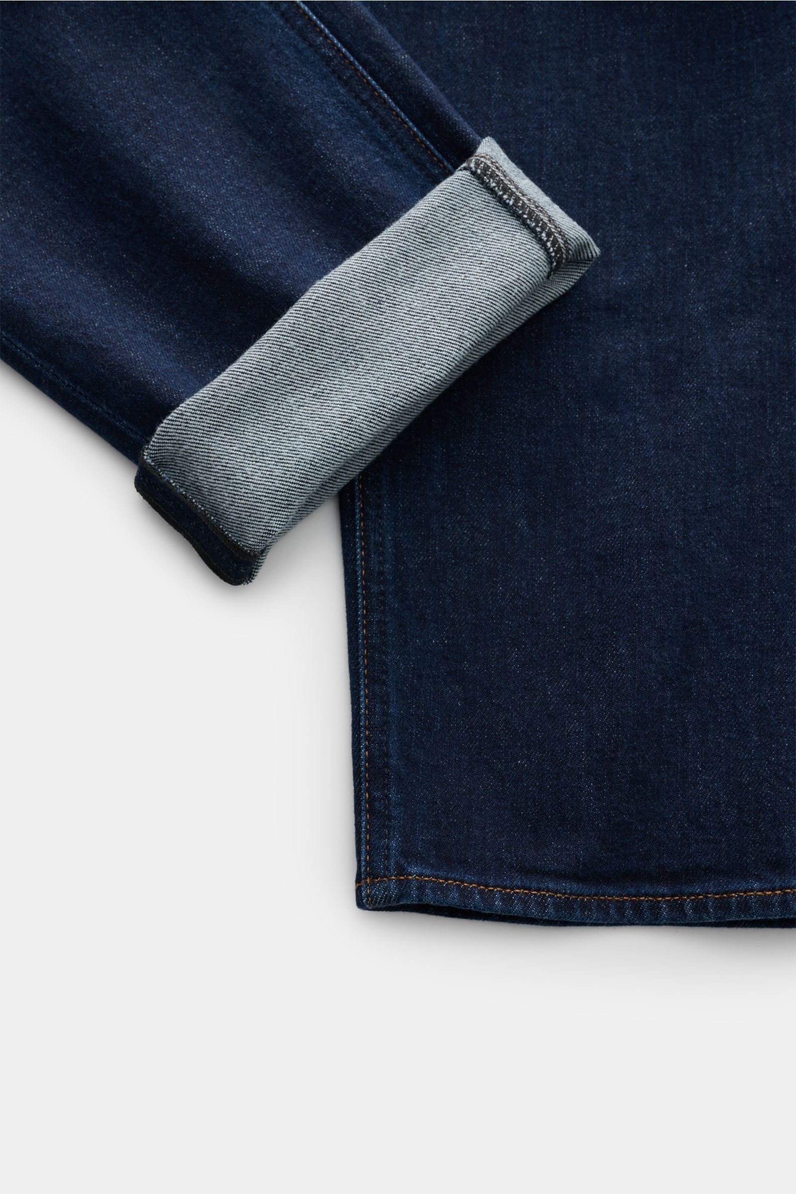 Stone Island Jeans 'Stretch Indigo Denim - Rinsed' dunkelblau, Detailaufnahme Saum und Umschlag, Slim Fit, elastische Baumwolle, Five-Pocket-Stil.