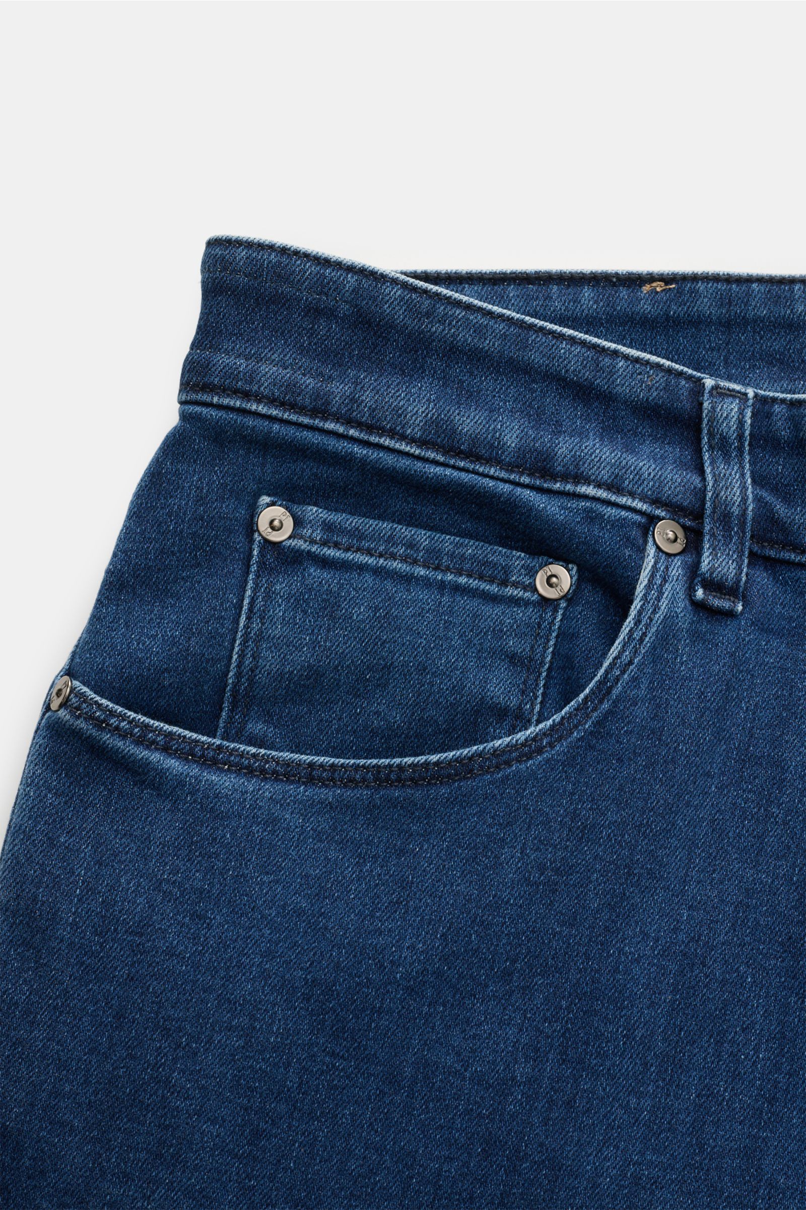 Close-up front view of PT Torino Denim Jeans 'Jazz' dunkelblau in dark blue, showing slim fit, soft cotton and lyocell denim with high stretch, classic five-pocket style, zip fly, subtle wash, narrow calf, and leather patch. For all who want timeless styl