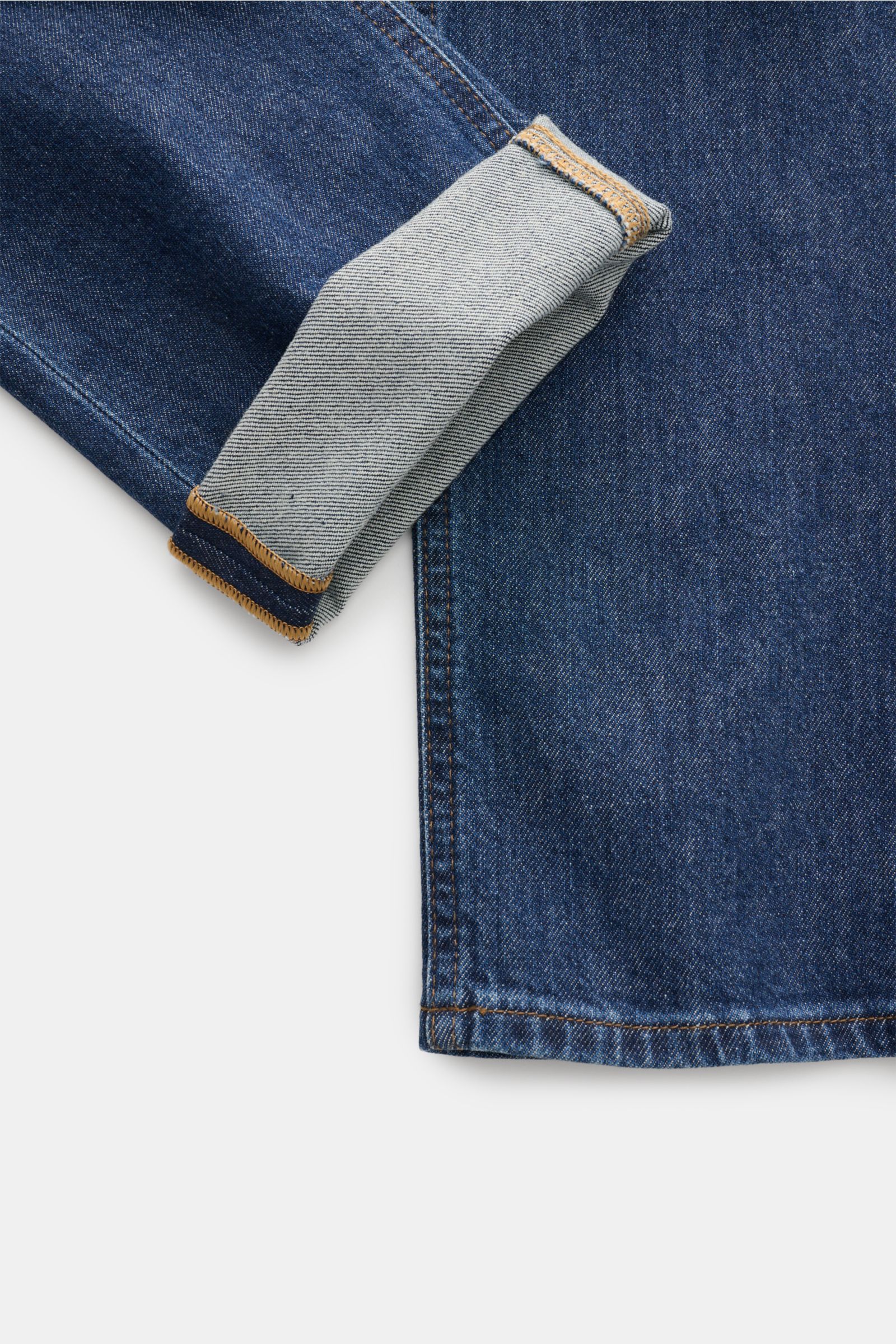 HandPicked Jeans 'Ravello' dunkelblau, extra schmal, aus Baumwolle mit leichter Elastizität, dezenter Used-Waschung, schmal zulaufend, Detailaufnahme vom Saum und Umschlag.