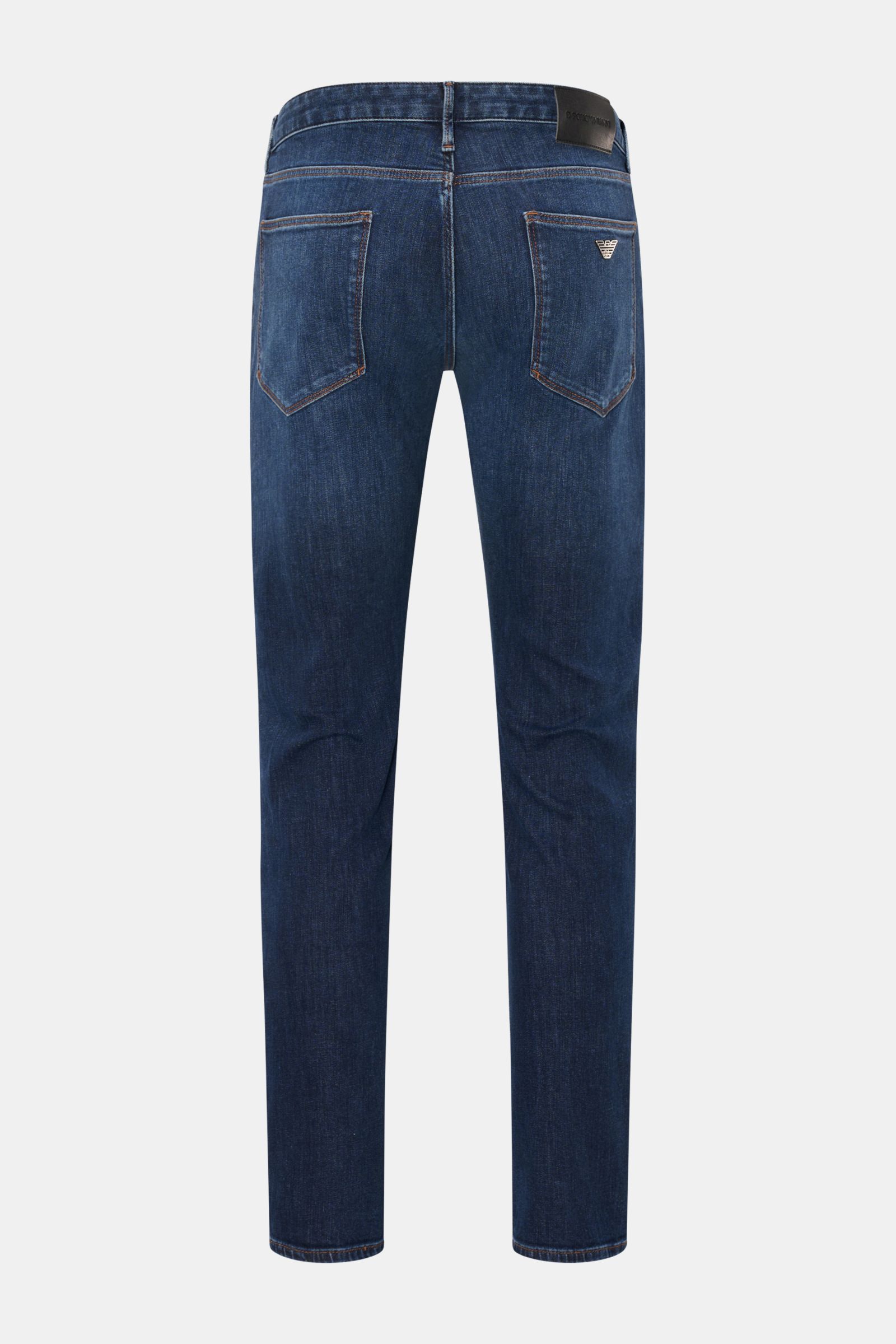 Rear view of Emporio Armani Jeans dark blue, slim fit with tapered cut, five-pocket style, metal logos, and leather patch.

Comfort meets style: These jeans by EMPORIO ARMANI have a comfortable feel and a timeless aesthetic for modern casual looks.