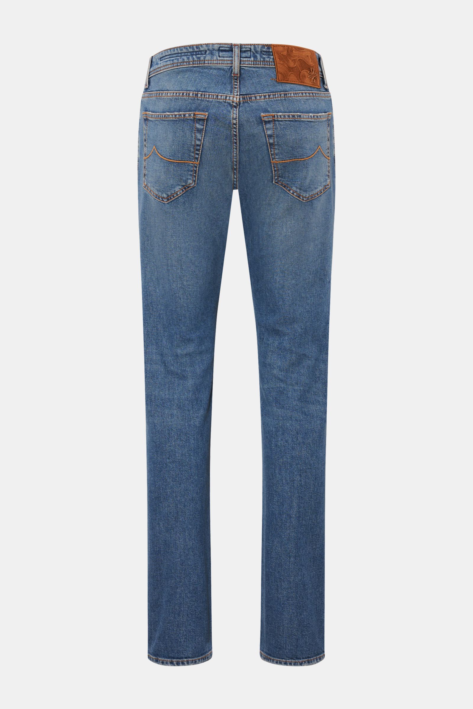 Rear view of Jacob Cohen Jeans 'Bard' smoky blue showing slim fit, tapered cut, subtle used wash, five-pocket style, button fly, and stitched leather patch. Modern luxury for everyday wear – why not? The premium jeans 'Bard' by JACOB COHEN combine robust,