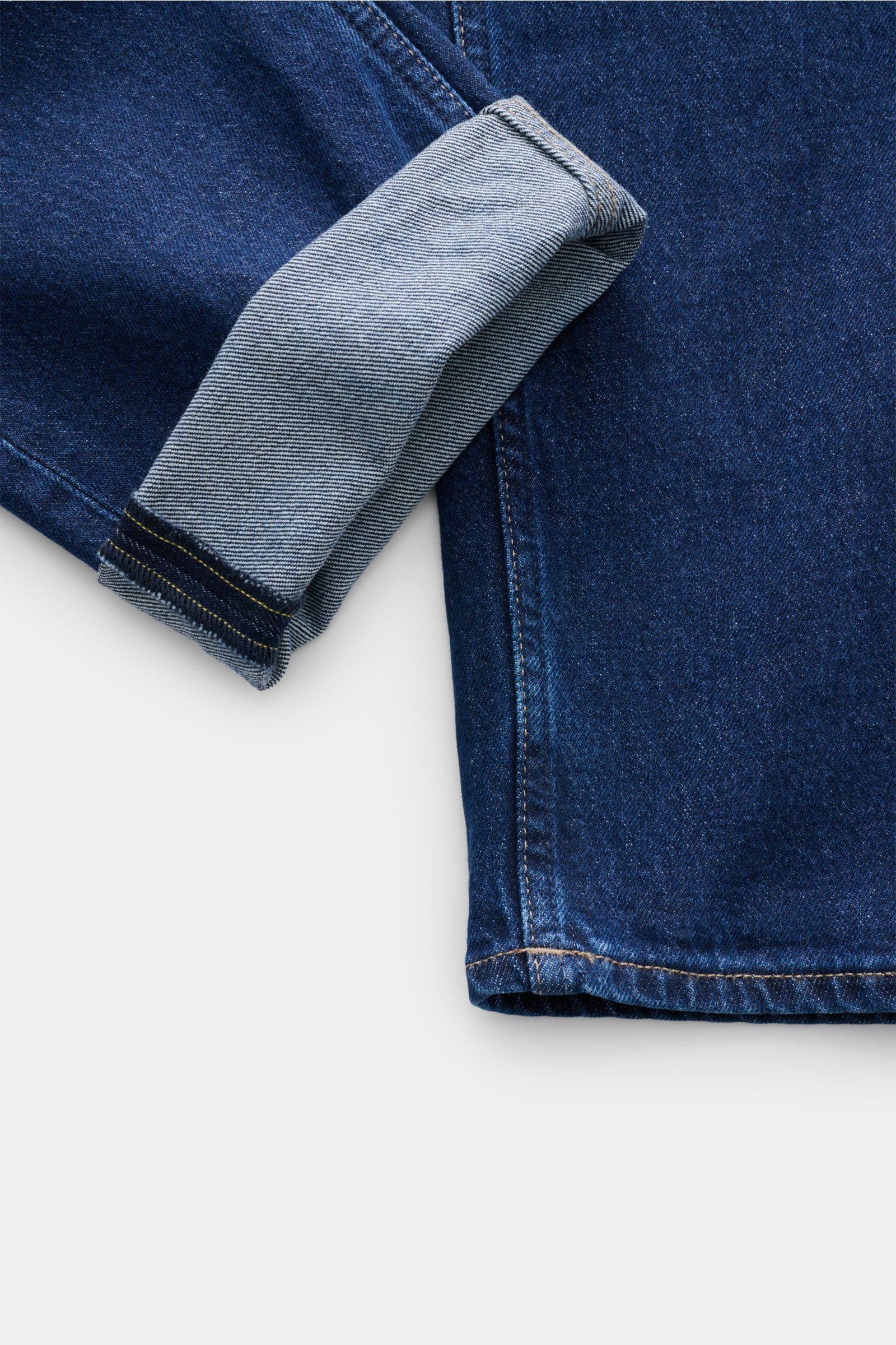 Close-up of the lower leg and cuff of Closed Jeans 'Cooper' navy, showing the denim's authentic used wash and texture from a side angle. The Regular Fit Jeans 'Cooper' from the Hamburg denim label CLOSED is made of robust pure cotton with a slight stretch