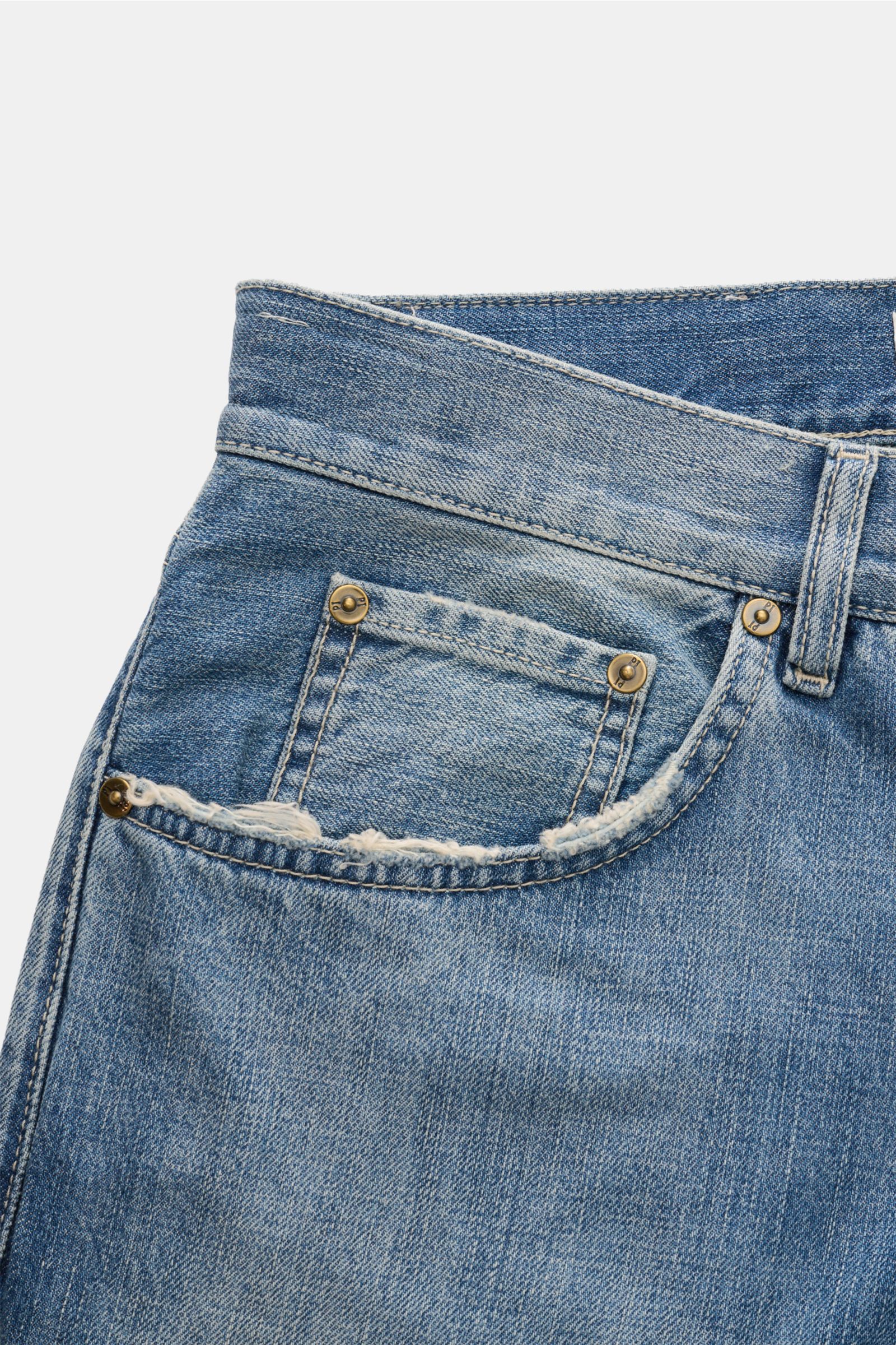 Close-up front view of PT Torino Denim Jeans 'Breakbeat' smoky blue showing slim fit cotton denim with used wash, distressed effects, button fly, five-pocket style, and leather patch. 

The slim fit model 'Breakbeat' by Italian label PT TORINO DENIM wi